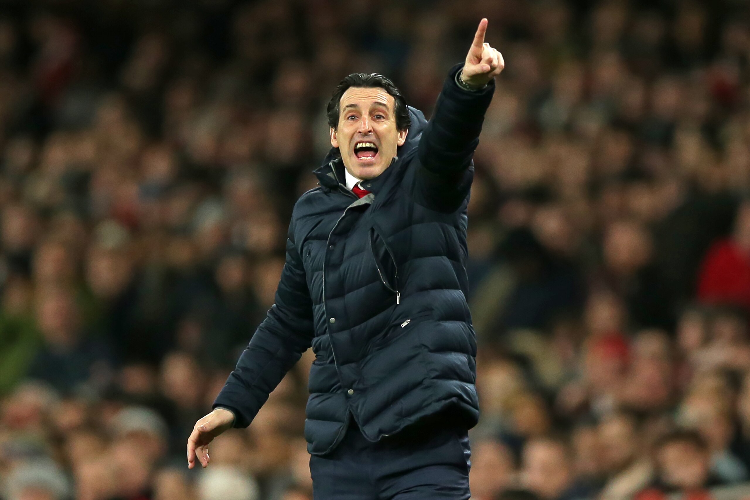 Arsenal's Spanish head coach Unai Emery gestures on the touchline during the English FA Cup fourth round football match between Arsenal and Manchester United at the Emirates Stadium in London on January 25, 2019. (Photo by Daniel LEAL-OLIVAS / AFP) / REST