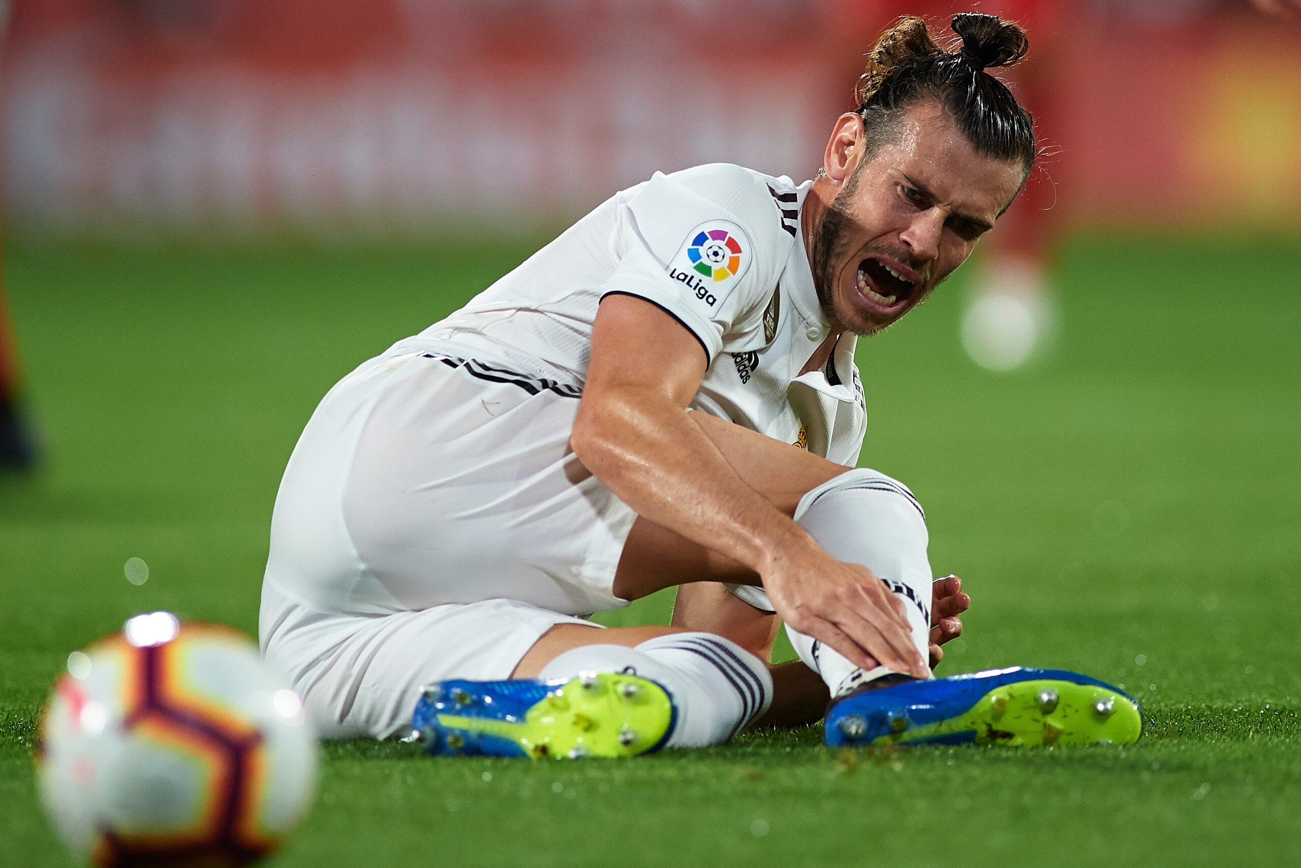 GIRONA, SPAIN - AUGUST 26:  Gareth Bale of Real Madrid lies injured on the pitch during the La Liga match between Girona FC and Real Madrid CF at Montilivi Stadium on August 26, 2018 in Girona, Spain.  (Photo by Quality Sport Images/Getty Images)
