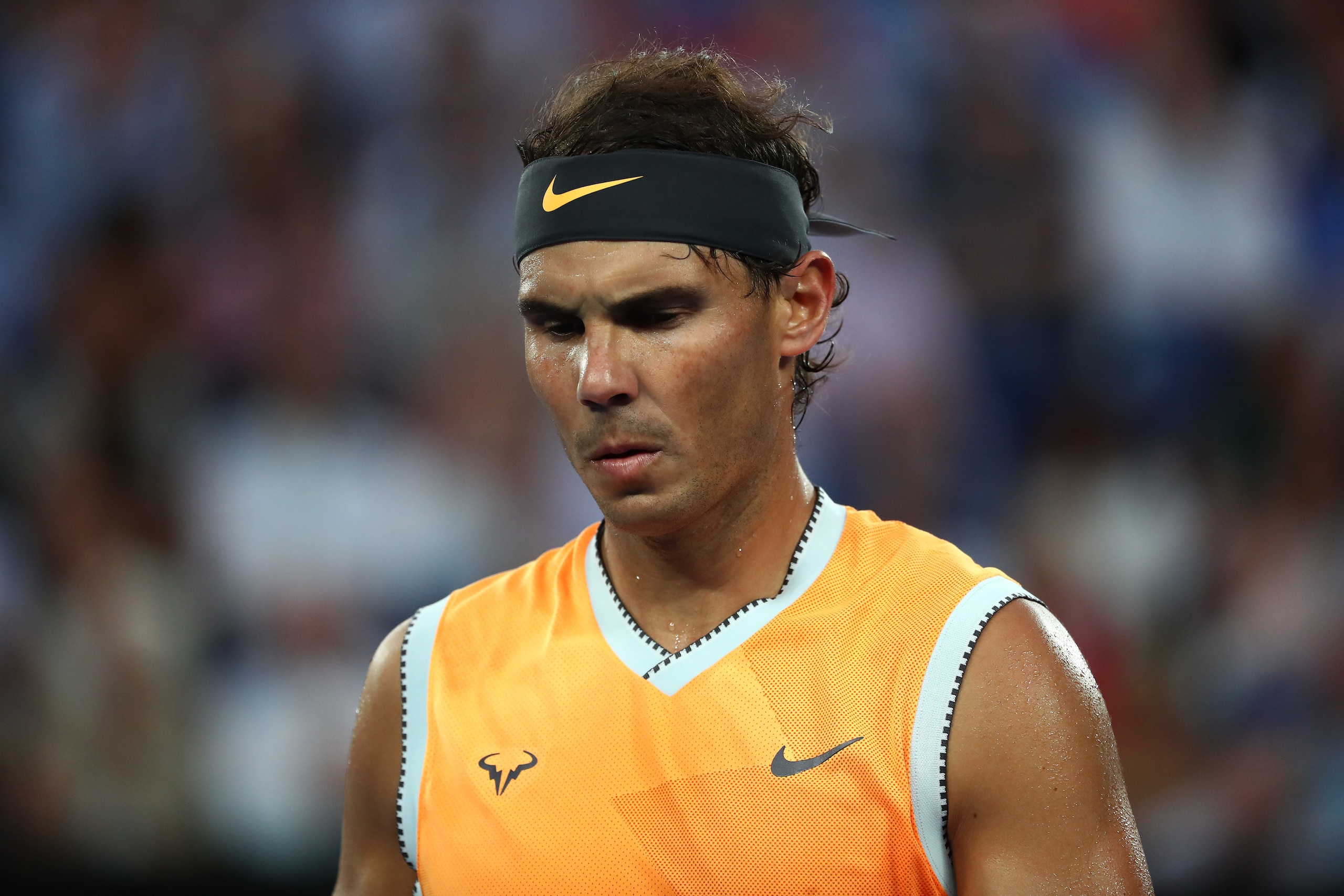 MELBOURNE, AUSTRALIA - JANUARY 27: Rafael Nadal of Spain looks on in his Men's Singles Final match against Novak Djokovic of Serbia during day 14 of the 2019 Australian Open at Melbourne Park on January 27, 2019 in Melbourne, Australia. (Photo by Michae MELBOURNE, AUSTRALIA - JANUARY 27: Rafael Nadal of Spain looks on in his Men's Singles Final match against Novak Djokovic of Serbia during day 14 of the 2019 Australian Open at Melbourne Park on January 27, 2019 in Melbourne, Australia. (Photo by Michae