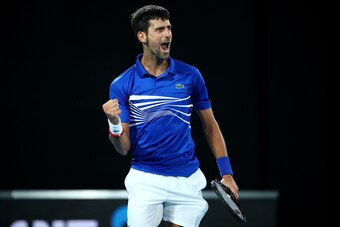 MELBOURNE, AUSTRALIA - JANUARY 27:  Novak Djokovic of Serbia celebrates a point in his Men's Singles Final match against Rafael Nadal of Spain during day 14 of the 2019 Australian Open at Melbourne Park on January 27, 2019 in Melbourne, Australia.  (Photo