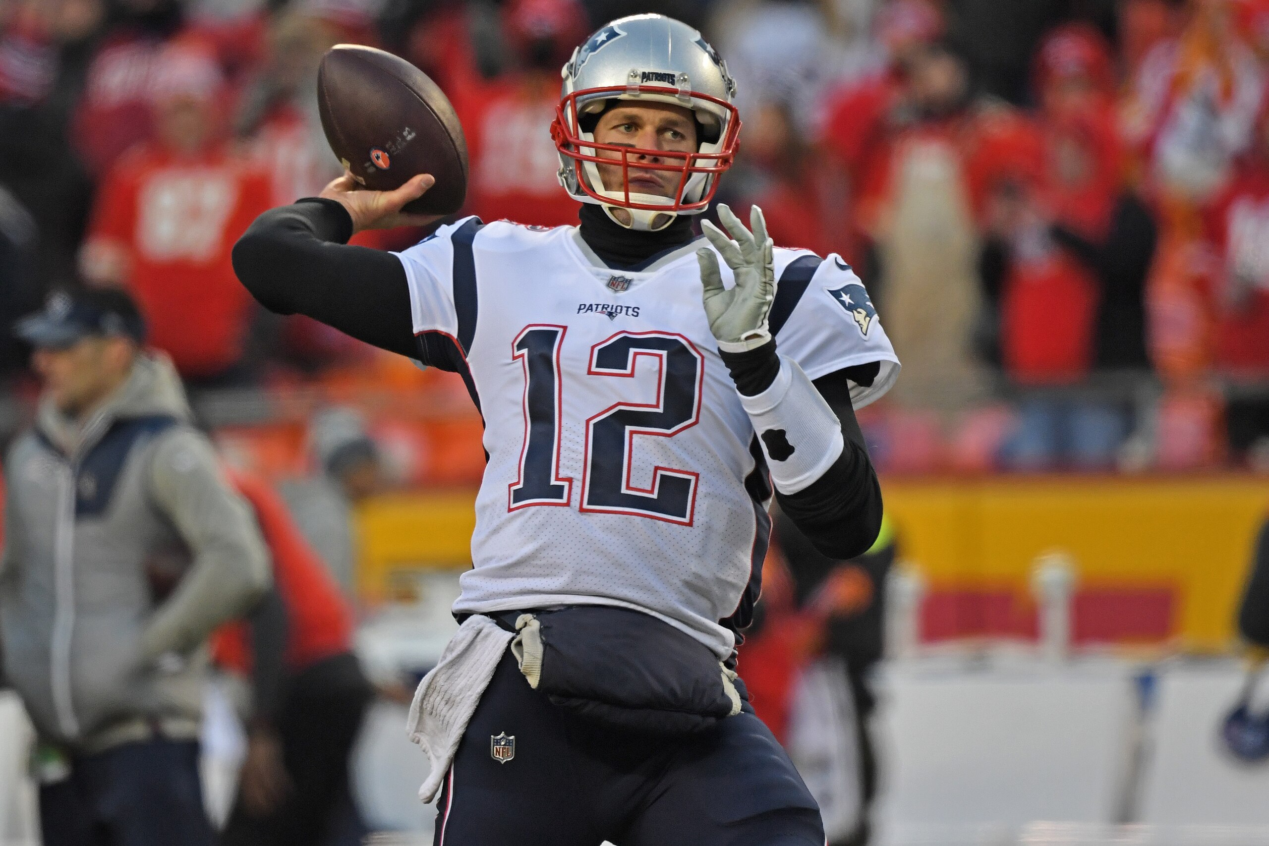 KANSAS CITY, MO - JANUARY 20:  Quarterback Tom Brady #12 of the New England Patriots warms up, prior to the AFC Championship Game against the Kansas City Chiefs at Arrowhead Stadium on January 20, 2019 in Kansas City, Missouri. (Photo by Peter G. Aiken/Ge