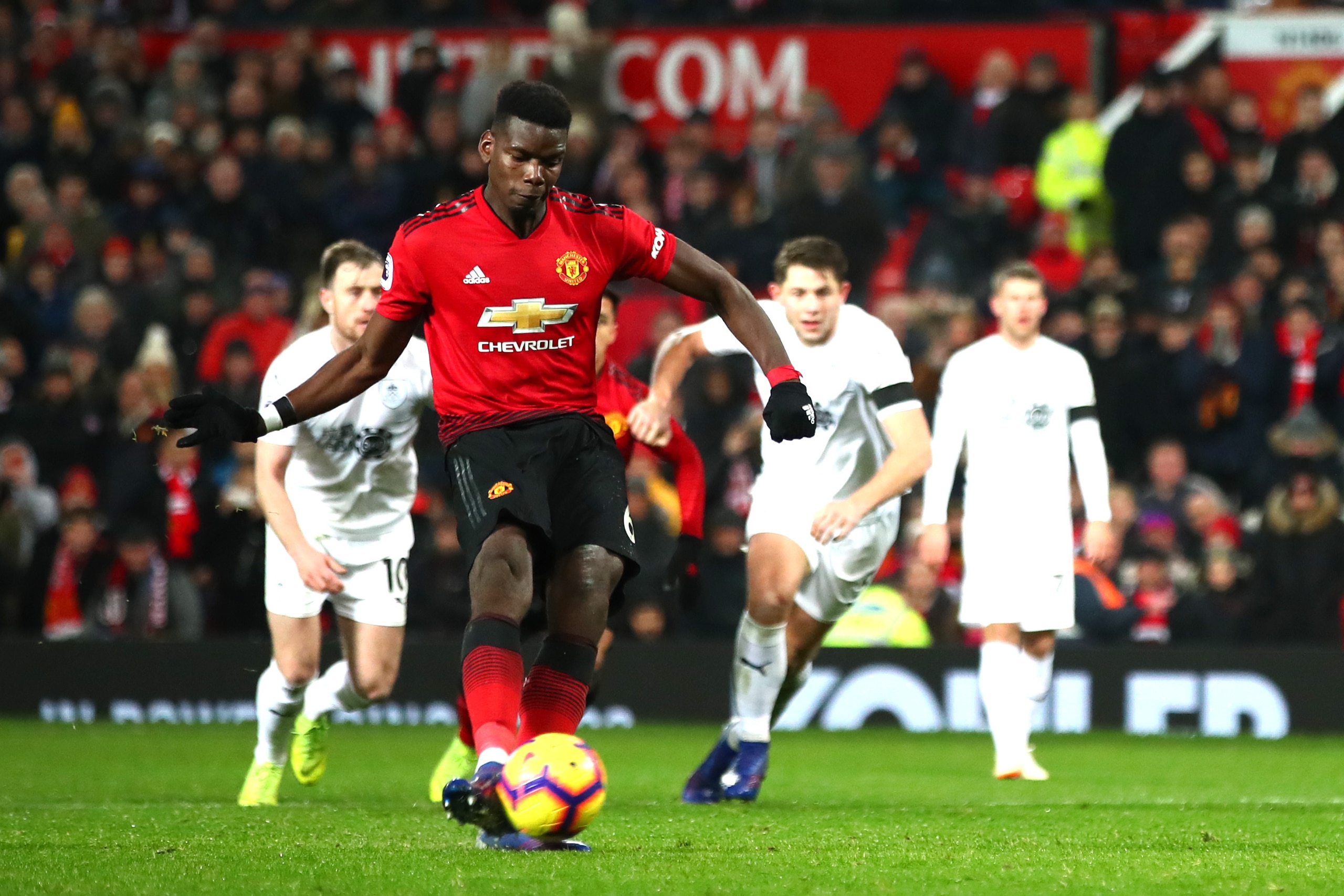 MANCHESTER, ENGLAND - JANUARY 29:  Paul Pogba of Manchester United scores his team's first goal from the penalty spot during the Premier League match between Manchester United and Burnley at Old Trafford on January 29, 2019 in Manchester, United Kingdom. 