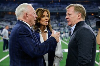 ARLINGTON, TEXAS - JANUARY 05: Dallas Cowboys owner Jerry Jones and Executive Vice President Charlotte Jones Anderson visit with NFL Commissioner Roger Goodell before the game between the Seattle Seahawks and Dallas Cowboys in  the Wild Card Round at AT&T