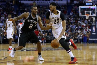NEW ORLEANS, LA - MARCH 03:  Anthony Davis #23 of the New Orleans Pelicans drives against Kawhi Leonard #2 of the San Antonio Spurs during the second half of a game at the Smoothie King Center on March 3, 2017 in New Orleans, Louisiana. NOTE TO USER: User