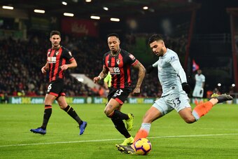 Chelsea's Brazilian-Italian defender Emerson Palmieri (R) crosses the ball during the English Premier League football match between Bournemouth and Chelsea at the Vitality Stadium in Bournemouth, southern England on January 30, 2019. (Photo by Glyn KIRK /