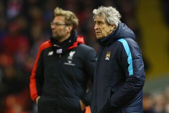 LIVERPOOL, ENGLAND - MARCH 02:  Manuel Pellegrini, manager of Manchester City and Jurgen Klopp look on during the Barclays Premier League match between Liverpool and Manchester City at Anfield on March 2, 2016 in Liverpool, England.  (Photo by Clive Bruns