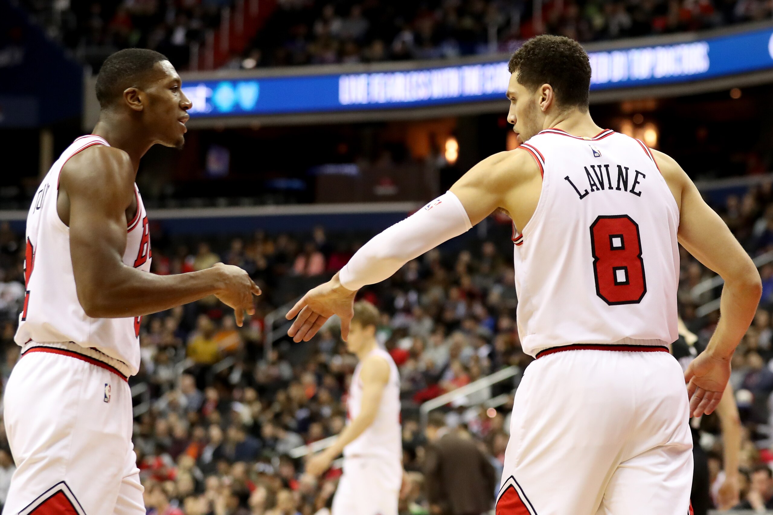 WASHINGTON, DC - DECEMBER 28: Zach LaVine #8 celebrates scoring with teammate Kris Dunn #32 of the Chicago Bulls in the second half against the Washington Wizards at Capital One Arena on December 28, 2018 in Washington, DC. NOTE TO USER: User expressly ac