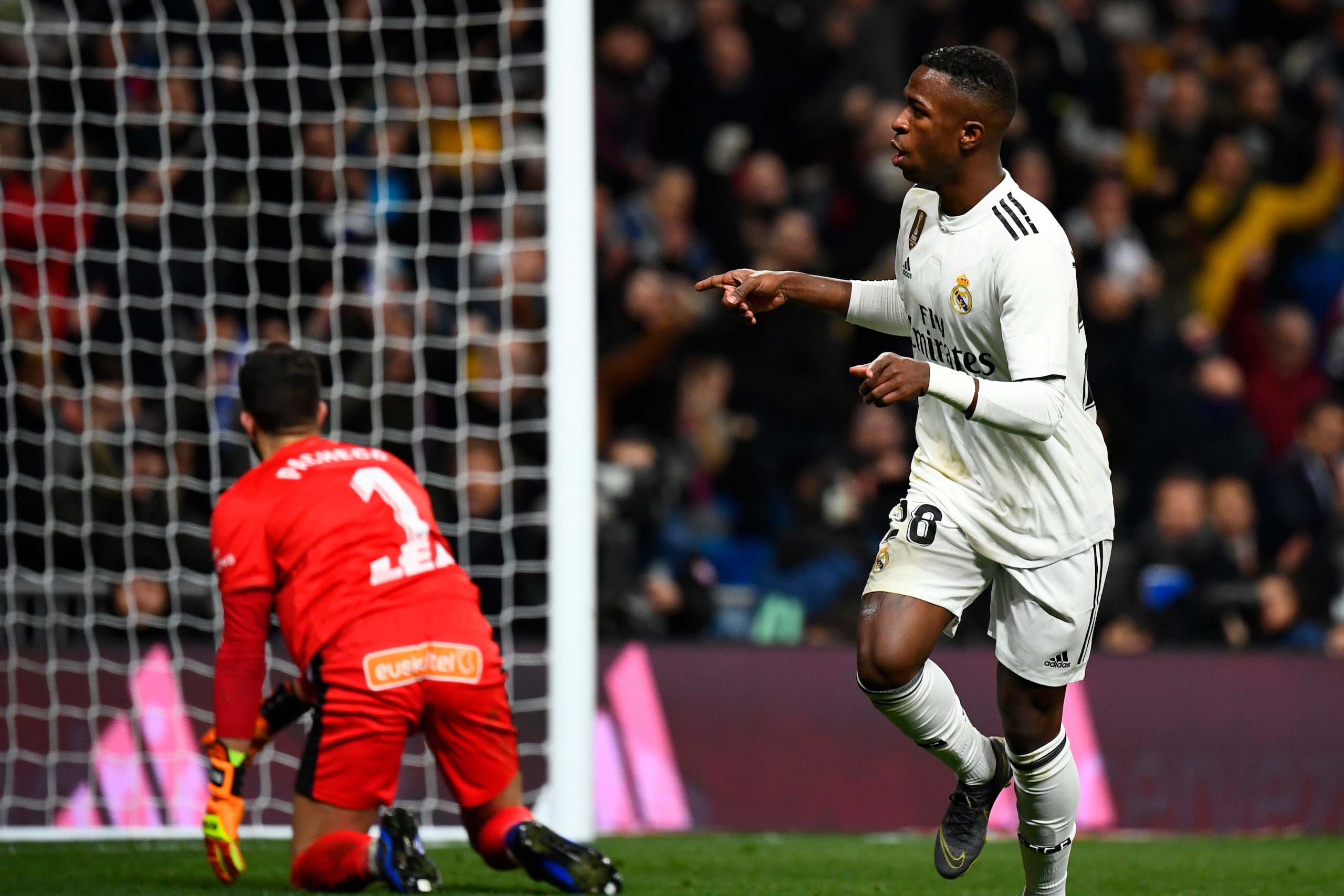 Real Madrid's Brazilian forward Vinicius Junior celebrates his goal during the Spanish league football match Real Madrid CF against Club Deportivo Alaves at the Santiago Bernabeu stadium in Madrid on February 3, 2019. (Photo by GABRIEL BOUYS / AFP)       