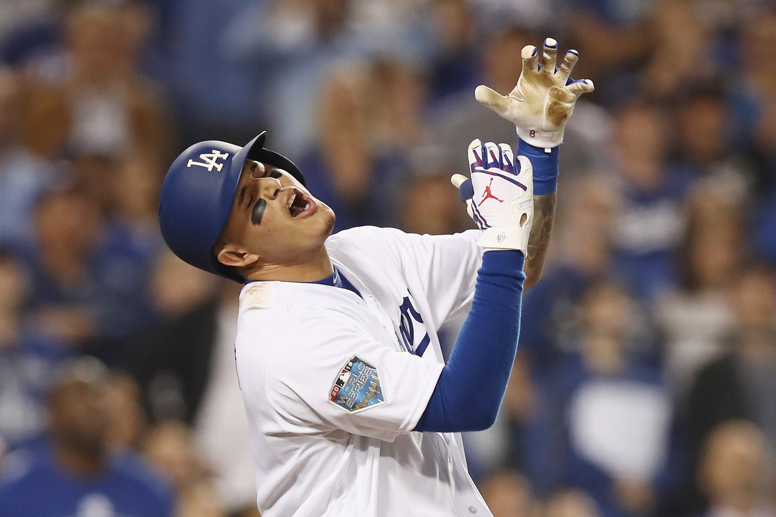 LOS ANGELES, CA - OCTOBER 26:  Manny Machado #8 of the Los Angeles Dodgers reacts after flying out during the tenth inning against the Boston Red Sox in Game Three of the 2018 World Series at Dodger Stadium on October 26, 2018 in Los Angeles, California. 