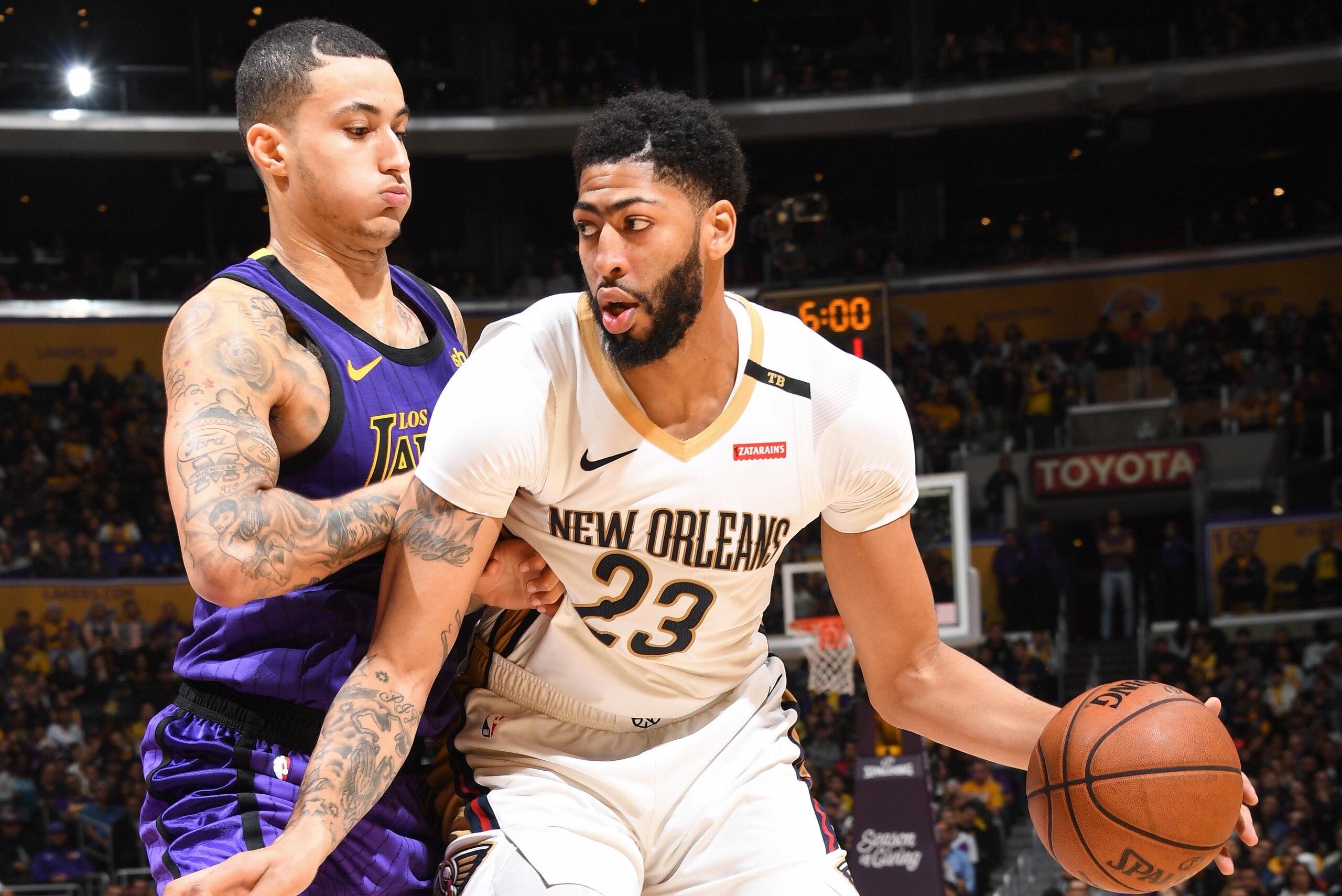 LOS ANGELES, CA - DECEMBER 21: Anthony Davis #23 of the New Orleans Pelicans jocks for a position during the game against Kyle Kuzma #0 of the Los Angeles Lakers on December 21, 2018 at STAPLES Center in Los Angeles, California. NOTE TO USER: User express