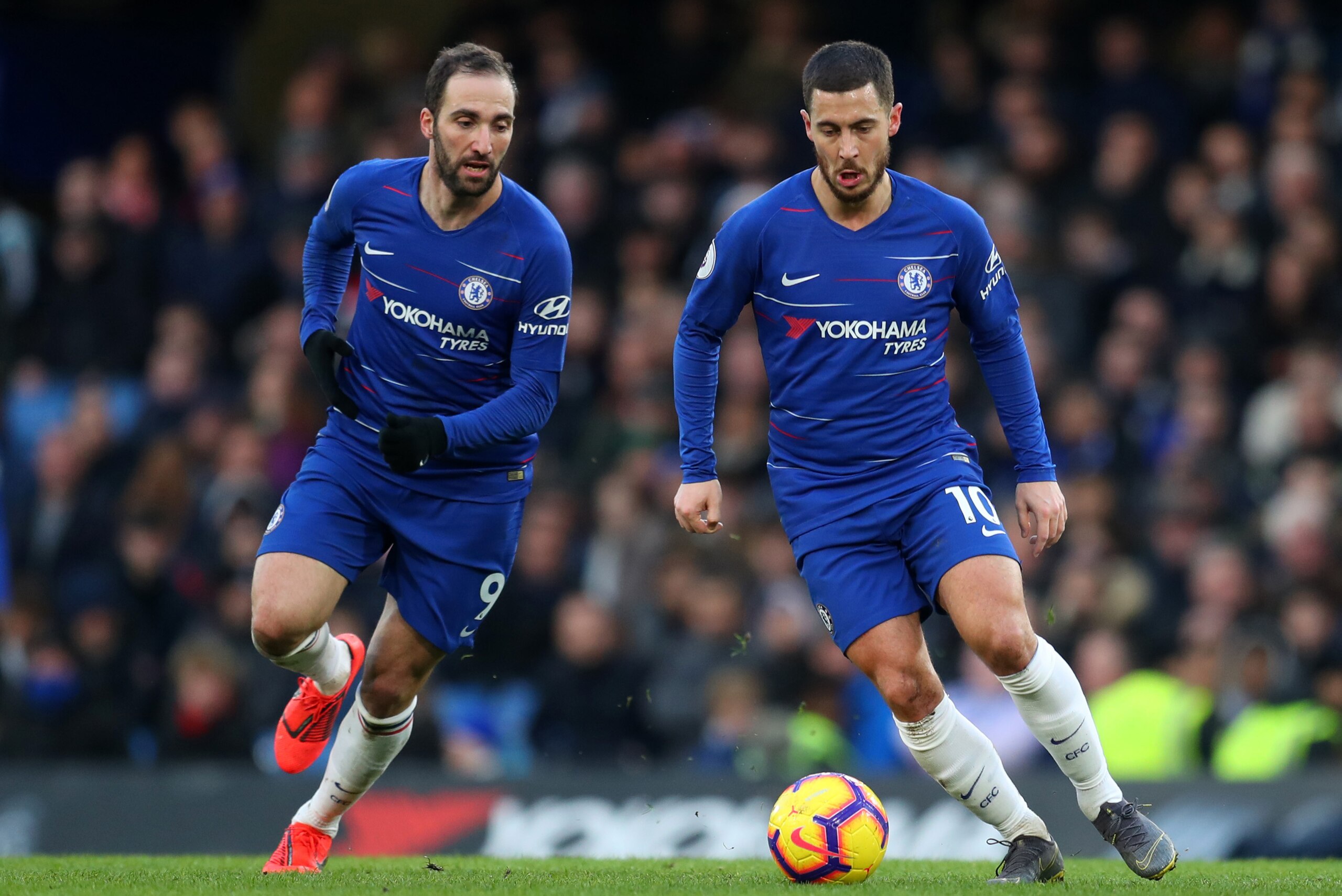 LONDON, ENGLAND - FEBRUARY 02: Gonzalo Higuain of Chelsea and Eden Hazard of Chelsea  during the Premier League match between Chelsea FC and Huddersfield Town at Stamford Bridge on February 02, 2019 in London, United Kingdom. (Photo by Catherine Ivill/Get