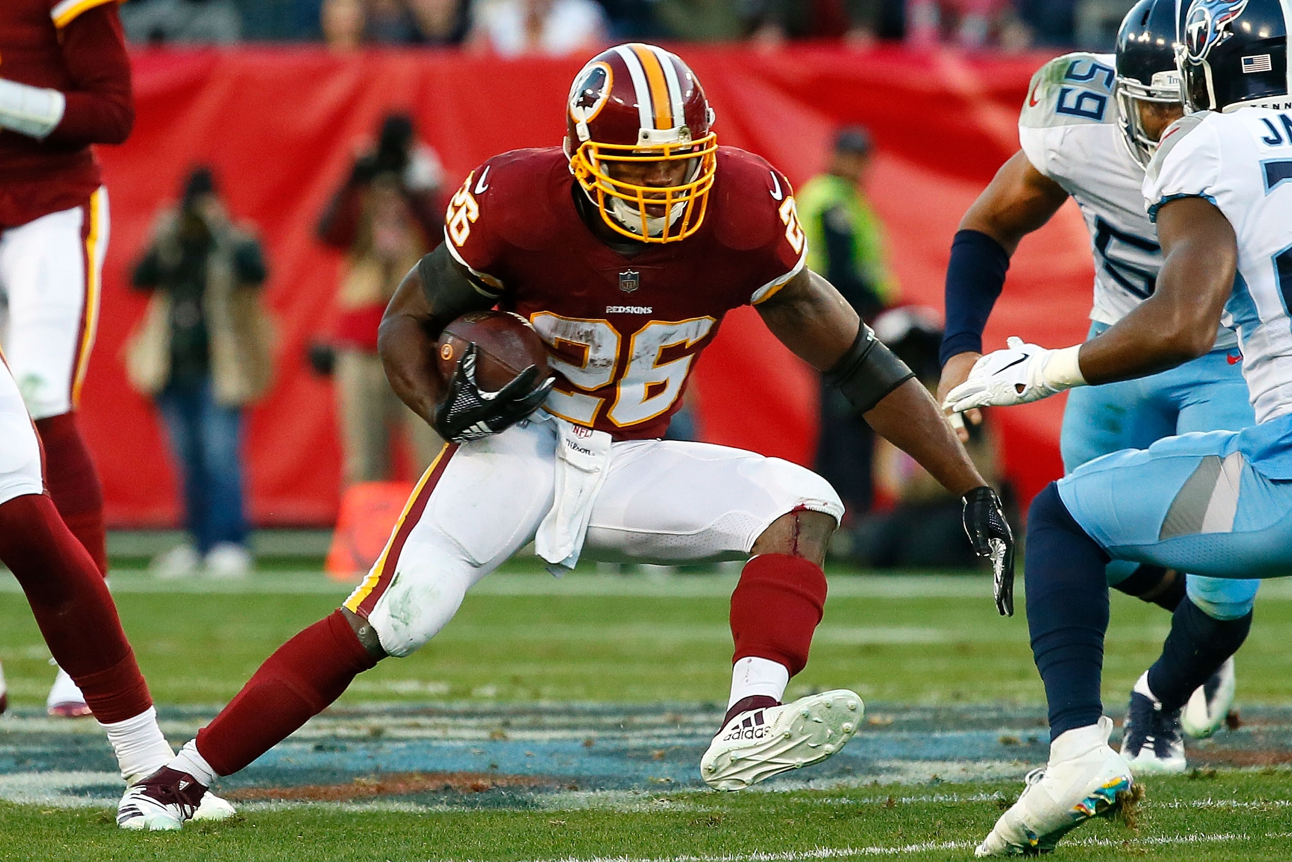 NASHVILLE, TN - DECEMBER 22:  Adrian Peterson #26 of the Washington Redskins plays against the Tennessee Titans at Nissan Stadium on December 22, 2018 in Nashville, Tennessee.  (Photo by Frederick Breedon/Getty Images)