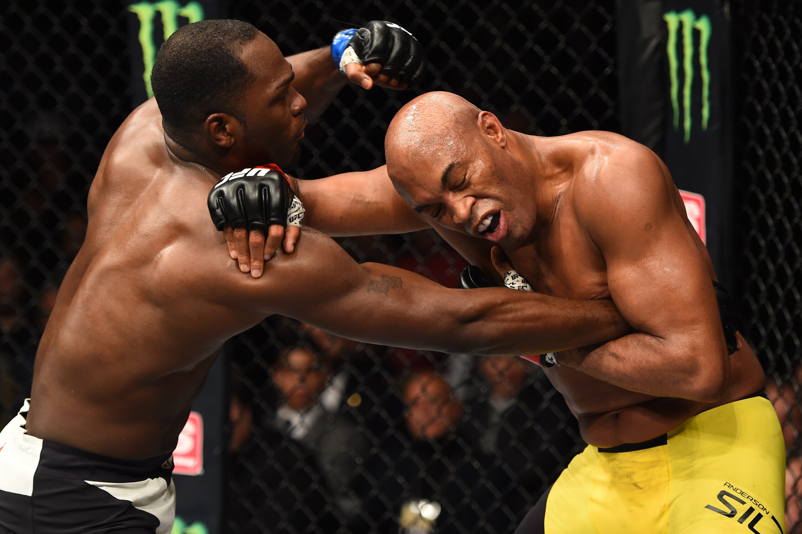 BROOKLYN, NEW YORK - FEBRUARY 11:  (L-R) Derek Brunson punches Anderson Silva of Brazil in their middleweight bout during the UFC 208 event inside Barclays Center on February 11, 2017 in Brooklyn, New York. (Photo by Jeff Bottari/Zuffa LLC/Zuffa LLC via G