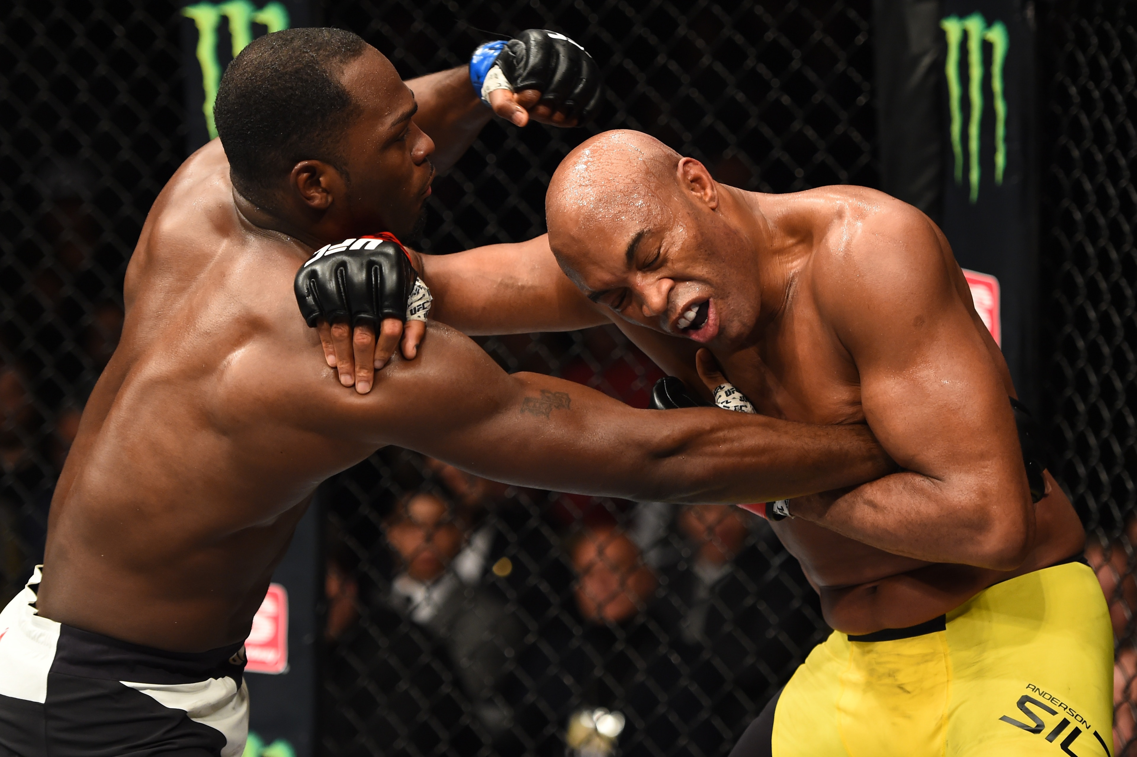BROOKLYN, NEW YORK - FEBRUARY 11:  (L-R) Derek Brunson punches Anderson Silva of Brazil in their middleweight bout during the UFC 208 event inside Barclays Center on February 11, 2017 in Brooklyn, New York. (Photo by Jeff Bottari/Zuffa LLC/Zuffa LLC via G