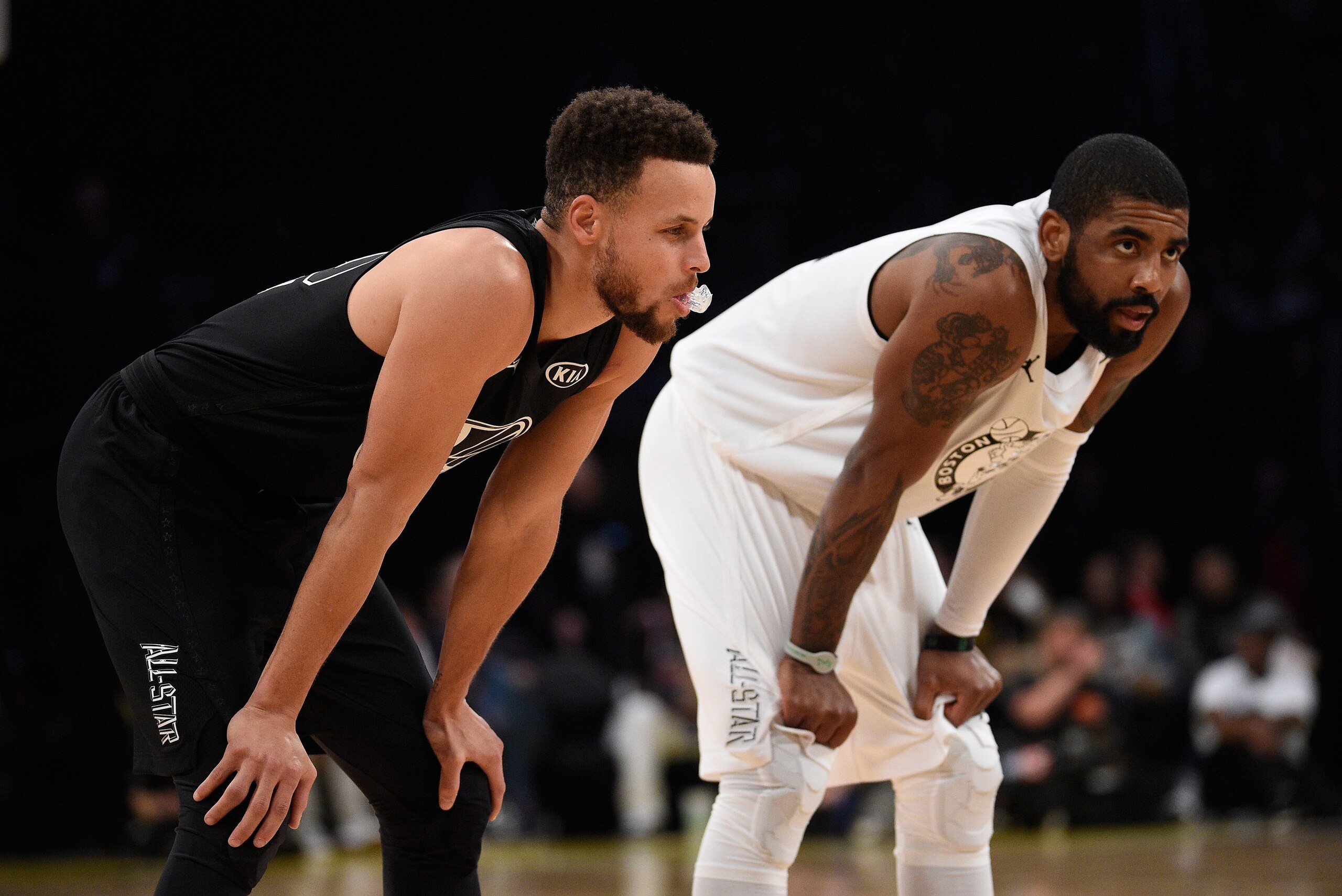 LOS ANGELES, CA - FEBRUARY 18:  Stephen Curry #30 of Team Stephen and Kyrie Irving #11 of Team LeBron take a breath during the NBA All-Star Game 2018 at Staples Center on February 18, 2018 in Los Angeles, California.  (Photo by Kevork Djansezian/Getty Ima