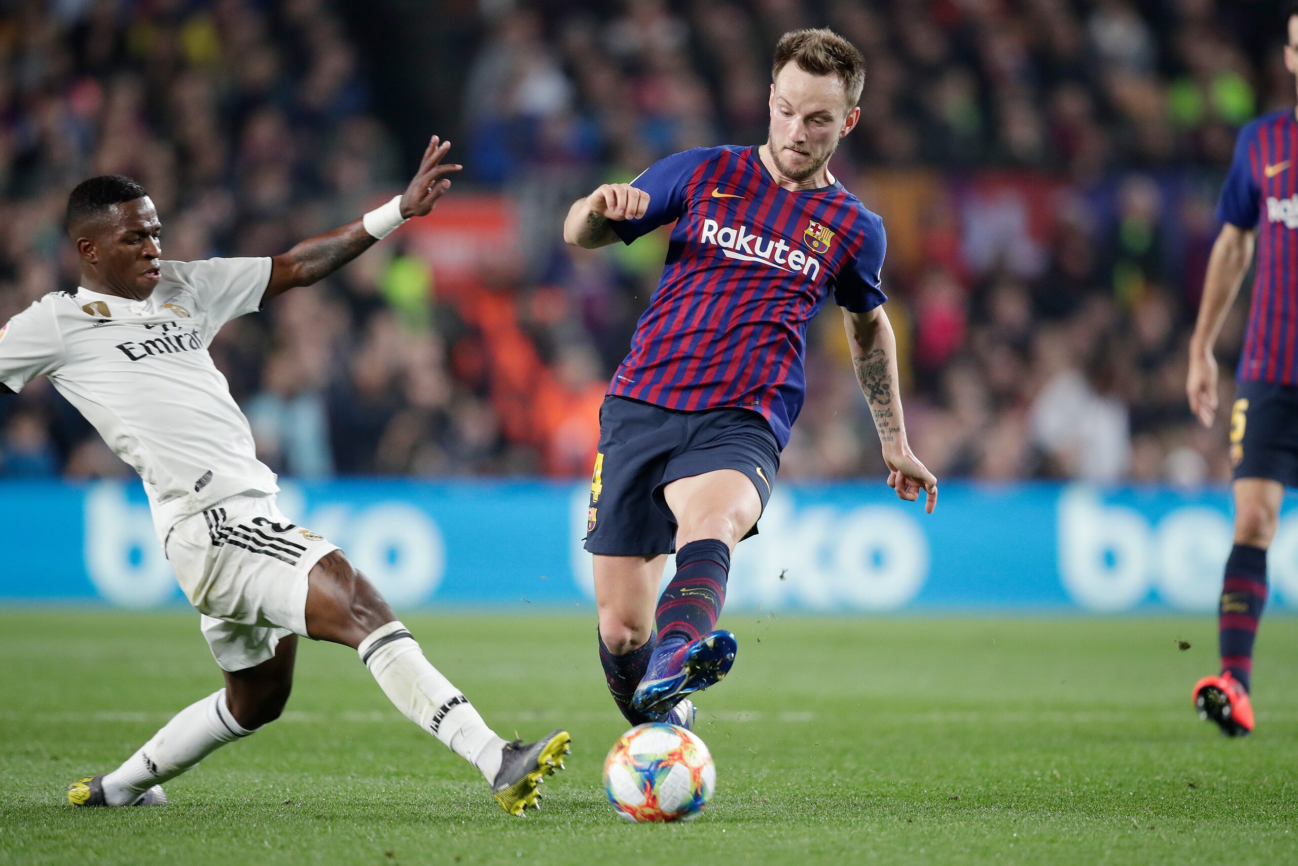BARCELONA, SPAIN - FEBRUARY 6: (L-R) Vinicius Junior of Real Madrid, Ivan Rakitic of FC Barcelona  during the Spanish Copa del Rey  match between FC Barcelona v Real Madrid at the Camp Nou on February 6, 2019 in Barcelona Spain (Photo by David S. Bustaman