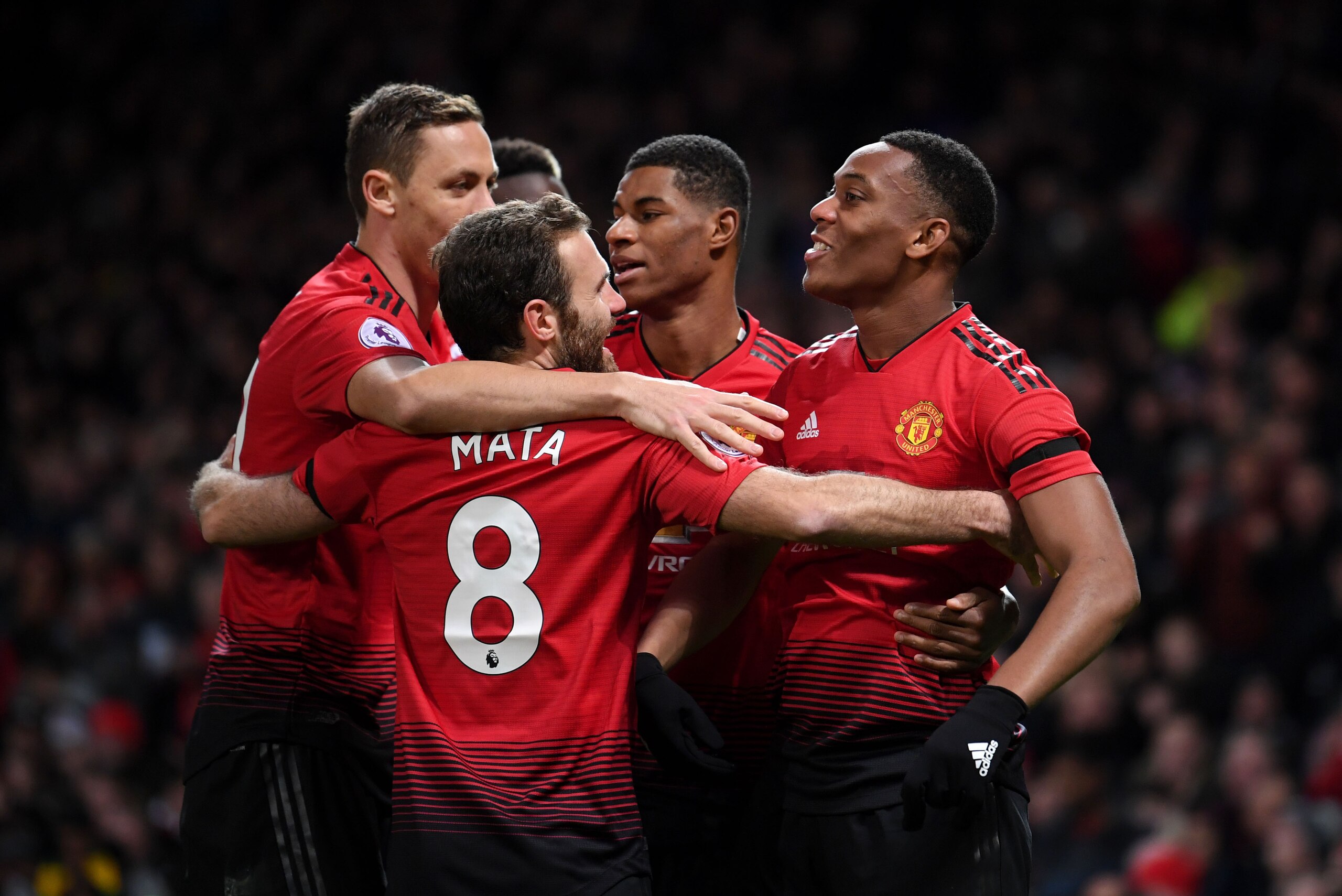 MANCHESTER, ENGLAND - OCTOBER 28: Anthony Martial celebrates with teammates Nemanja Matic, Marcus Rashford and Juan Mata after scoring his team's second goal during the Premier League match between Manchester United and Everton FC at Old Trafford on Octob