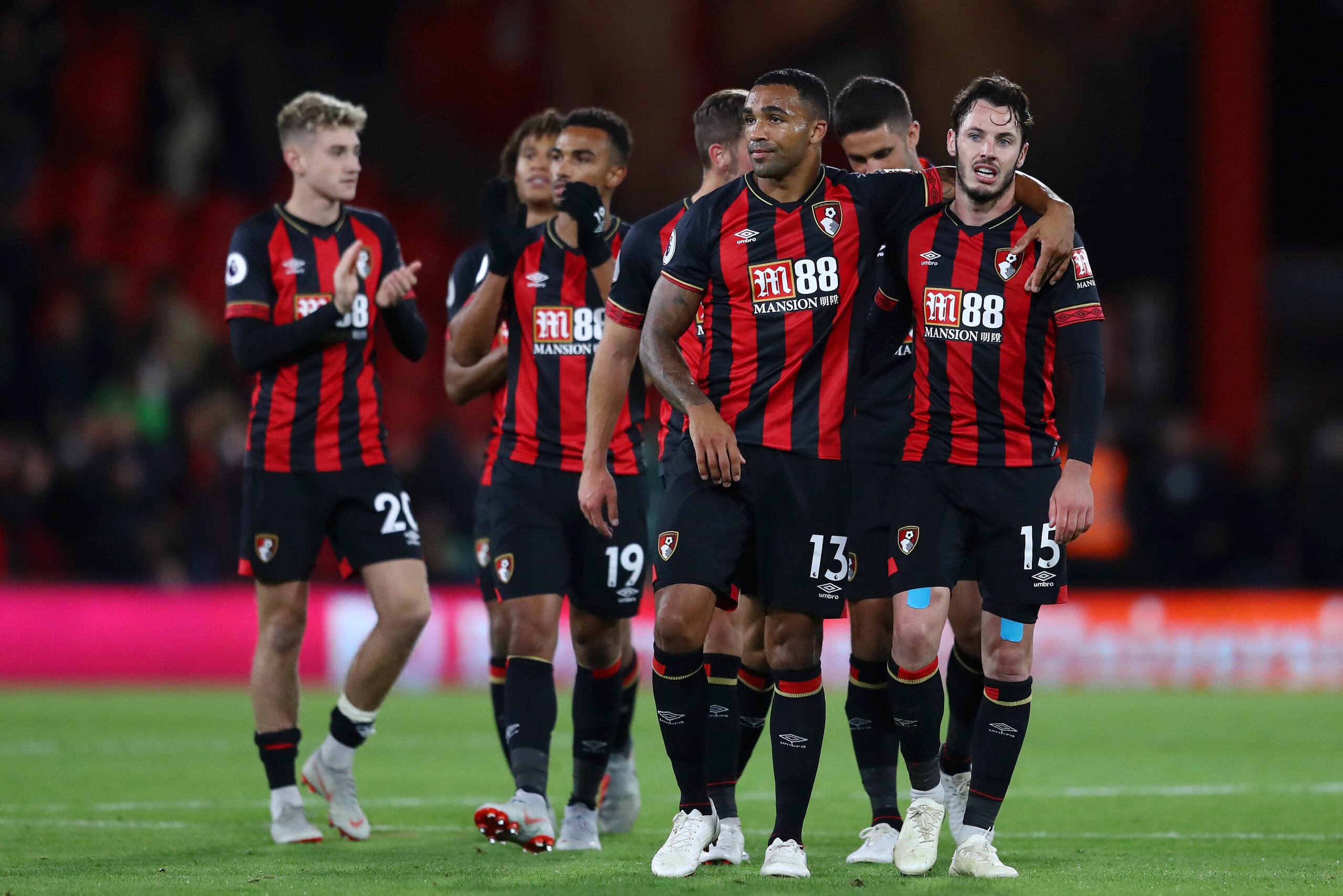 BOURNEMOUTH, ENGLAND - OCTOBER 01:  David Brooks, Junior Stanislas, Callum Wilson and Adam Smith of AFC Bournemouth celebrate at the full time whistle after the Premier League match between AFC Bournemouth and Crystal Palace at Vitality Stadium on October