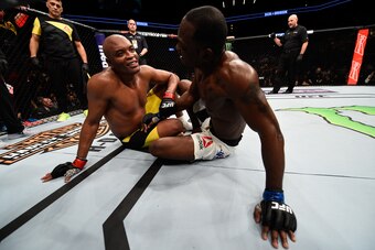 BROOKLYN, NEW YORK - FEBRUARY 11:  (L-R) Anderson Silva of Brazil and Derek Brunson embrace after their middleweight bout during the UFC 208 event inside Barclays Center on February 11, 2017 in Brooklyn, New York. (Photo by Jeff Bottari/Zuffa LLC/Zuffa LL