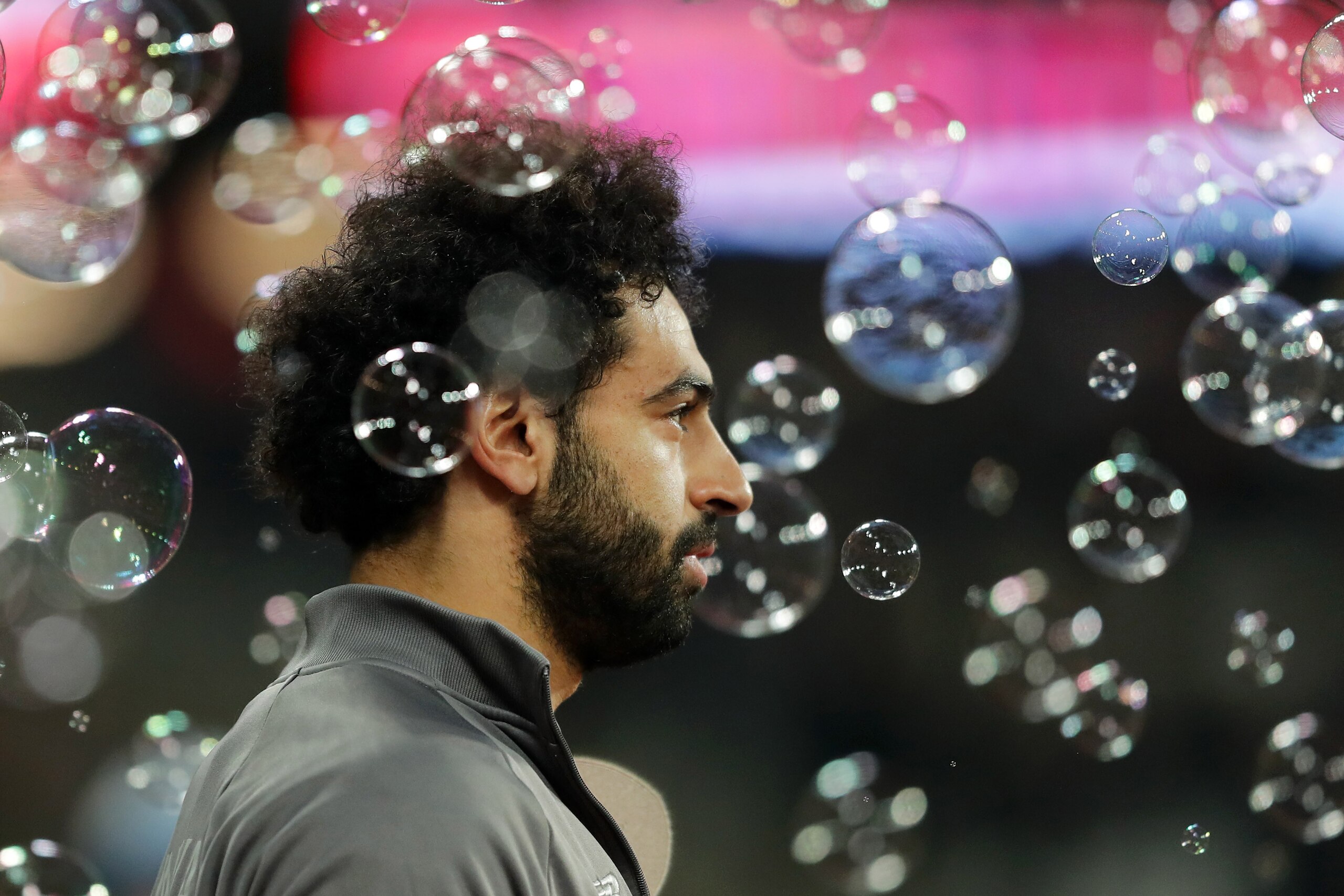 LONDON, ENGLAND - FEBRUARY 04: Mohamed Salah of Liverpool looks on as he enters the pitch prior to the Premier League match between West Ham United and Liverpool FC at London Stadium on February 04, 2019 in London, United Kingdom. (Photo by Richard Heathc LONDON, ENGLAND - FEBRUARY 04: Mohamed Salah of Liverpool looks on as he enters the pitch prior to the Premier League match between West Ham United and Liverpool FC at London Stadium on February 04, 2019 in London, United Kingdom. (Photo by Richard Heathc