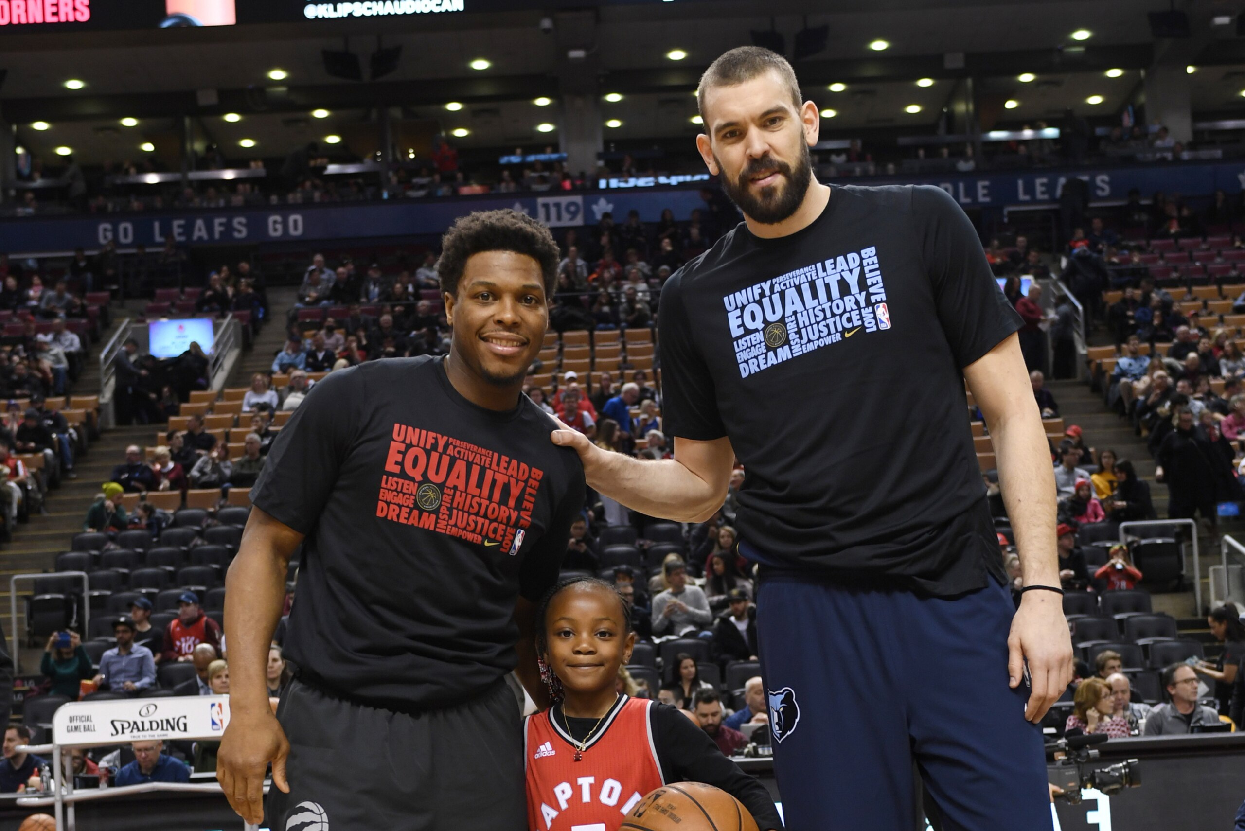 TORONTO, CANADA - FEBRUARY 4: Kyle Lowry #7 of the Toronto Raptors and Marc Gasol #33 of the Memphis Grizzlies pose with a young fan before the game on February 4, 2018 at the Air Canada Centre in Toronto, Ontario, Canada. NOTE TO USER: User expressly ac TORONTO, CANADA - FEBRUARY 4: Kyle Lowry #7 of the Toronto Raptors and Marc Gasol #33 of the Memphis Grizzlies pose with a young fan before the game on February 4, 2018 at the Air Canada Centre in Toronto, Ontario, Canada. NOTE TO USER: User expressly ac
