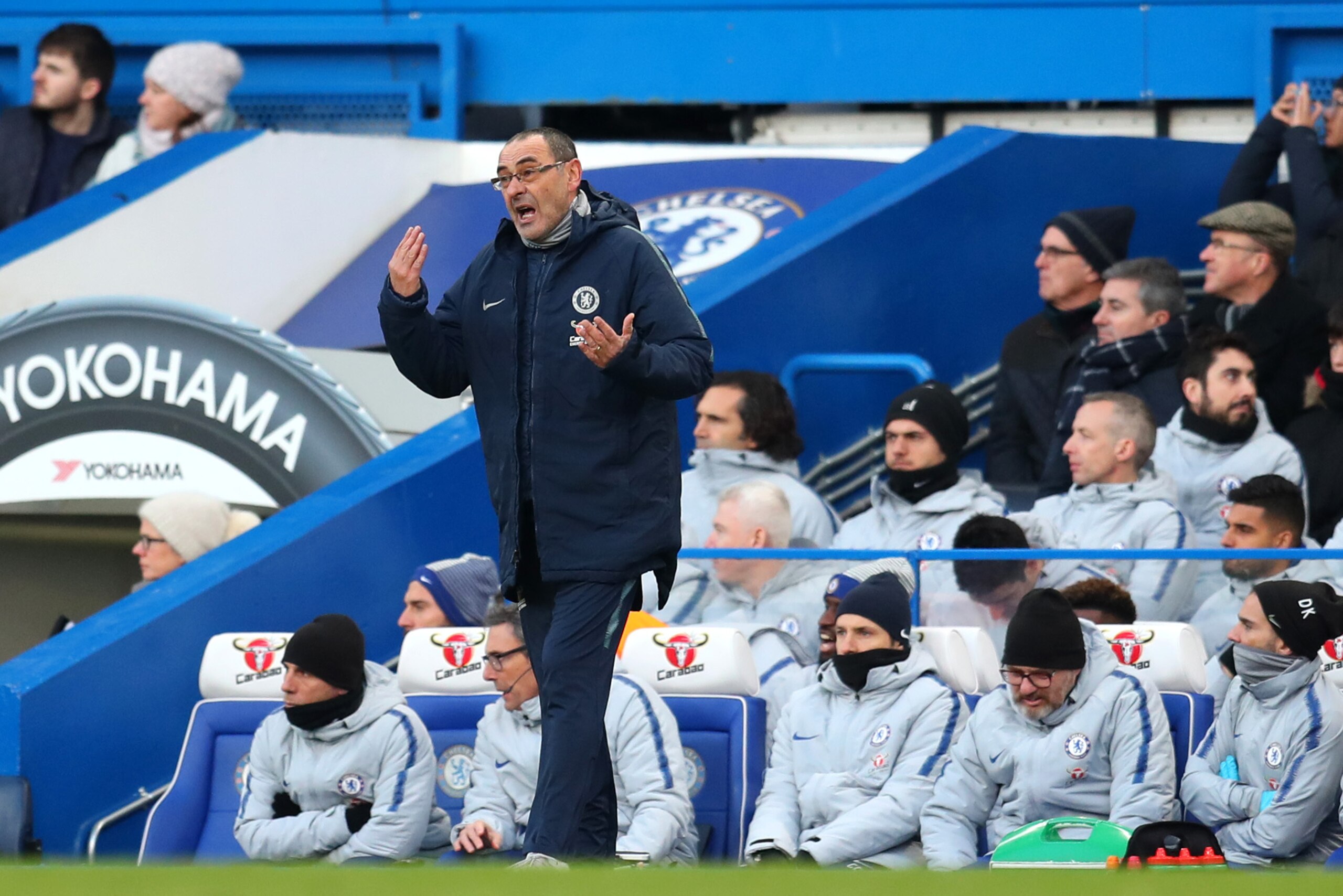 LONDON, ENGLAND - FEBRUARY 02: Maurizio Sarri, Manager of Chelsea gives his team instructions during the Premier League match between Chelsea FC and Huddersfield Town at Stamford Bridge on February 2, 2019 in London, United Kingdom.  (Photo by Catherine I
