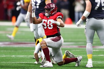 SAN ANTONIO, TEXAS - FEBRUARY 09: Tyrone Holmes #58 of the San Antonio Commanders celebrates after sacking Mike Bercovici #11 of the San Diego Fleet during the first quarter in an Alliance of American Football game at the Alamodome on February 09, 2019 in