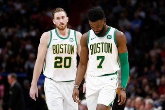 MIAMI, FL - JANUARY 10:  Gordon Hayward #20 and Jaylen Brown #7 of the Boston Celtics react against the Miami Heat at American Airlines Arena on January 10, 2019 in Miami, Florida. NOTE TO USER: User expressly acknowledges and agrees that, by downloading 