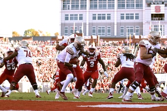 RALEIGH, NC - NOVEMBER 03: Alim McNeill #29 of the North Carolina State Wolfpack sacks James Blackman #1 of the Florida State Seminoles at Carter-Finley Stadium on November 3, 2018 in Raleigh, North Carolina. (Photo by Lance King/Getty Images)