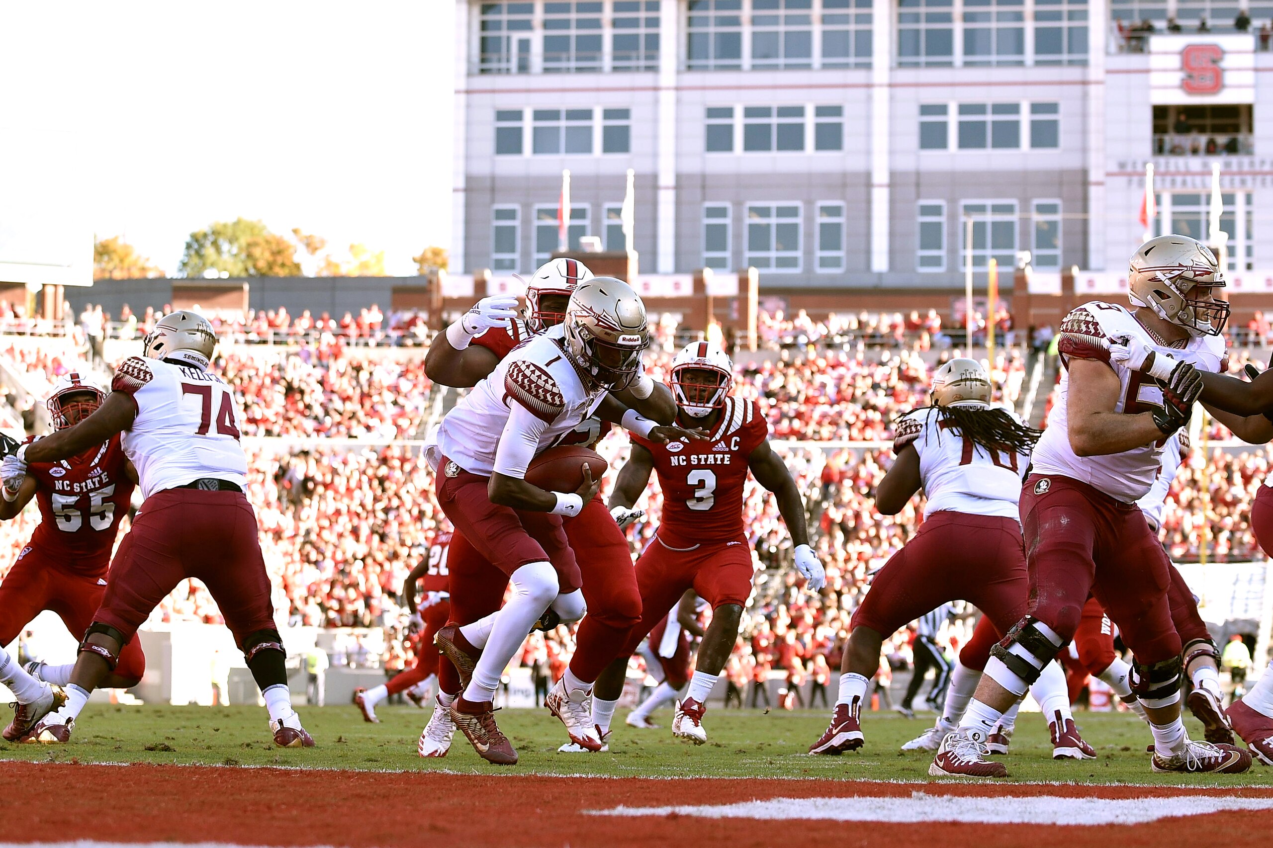 RALEIGH, NC - NOVEMBER 03: Alim McNeill #29 of the North Carolina State Wolfpack sacks James Blackman #1 of the Florida State Seminoles at Carter-Finley Stadium on November 3, 2018 in Raleigh, North Carolina. (Photo by Lance King/Getty Images)