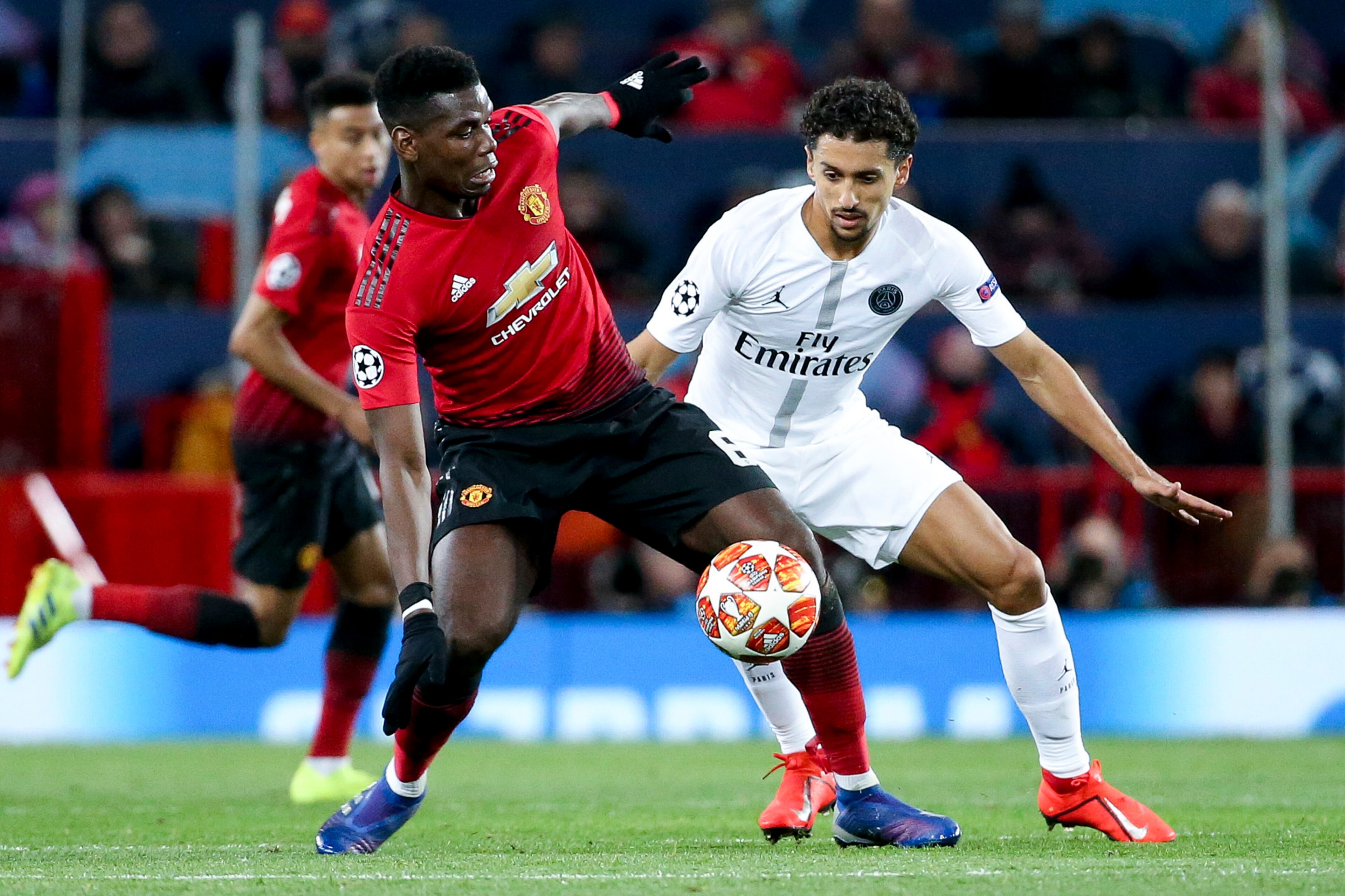 MANCHESTER, ENGLAND - FEBRUARY 12: Paul Pogba of Manchester United, Marquinhos of PSG during the UEFA Champions League Round of 16 First Leg match between Manchester United (Man U) and Paris Saint-Germain (PSG) at Old Trafford stadium on February 12, 2019 MANCHESTER, ENGLAND - FEBRUARY 12: Paul Pogba of Manchester United, Marquinhos of PSG during the UEFA Champions League Round of 16 First Leg match between Manchester United (Man U) and Paris Saint-Germain (PSG) at Old Trafford stadium on February 12, 2019