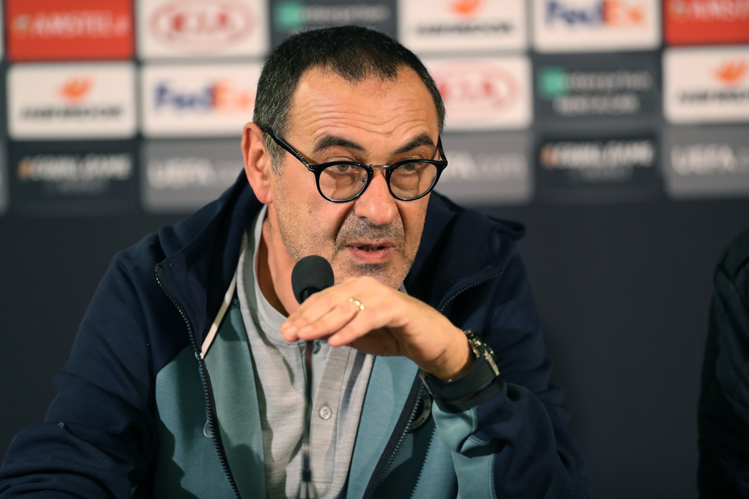 Chelsea's manager Maurizio Sarri speaks during a press conference in Malmo, Sweden, on February 13, 2019 one day ahead of the Europa League first leg football match between Malmo FF and Chelsea. (Photo by Andreas HILLERGREN / TT NEWS AGENCY / AFP) / Swede Chelsea's manager Maurizio Sarri speaks during a press conference in Malmo, Sweden, on February 13, 2019 one day ahead of the Europa League first leg football match between Malmo FF and Chelsea. (Photo by Andreas HILLERGREN / TT NEWS AGENCY / AFP) / Swede