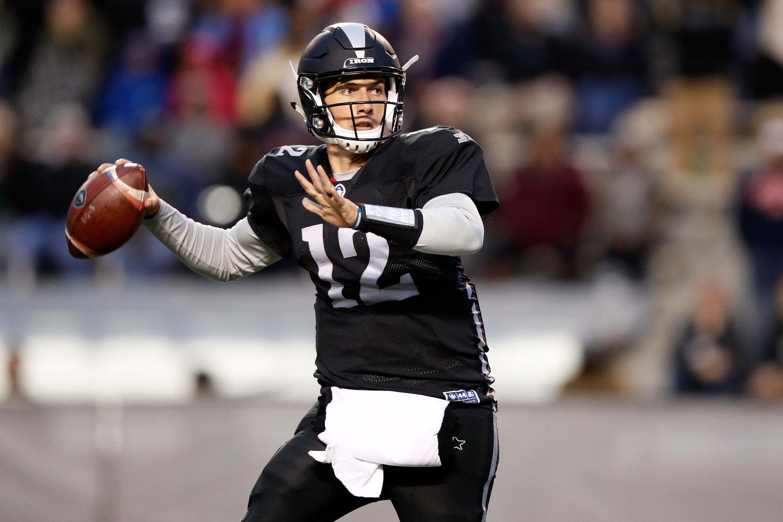 BIRMINGHAM, ALABAMA - FEBRUARY 10:  Luis Perez #12 of Birmingham Iron looks to pass during an Alliance of American Football game against the Memphis Express at Legion Field on February 10, 2019 in Birmingham, Alabama. (Photo by Joe Robbins/AAF/Getty Image