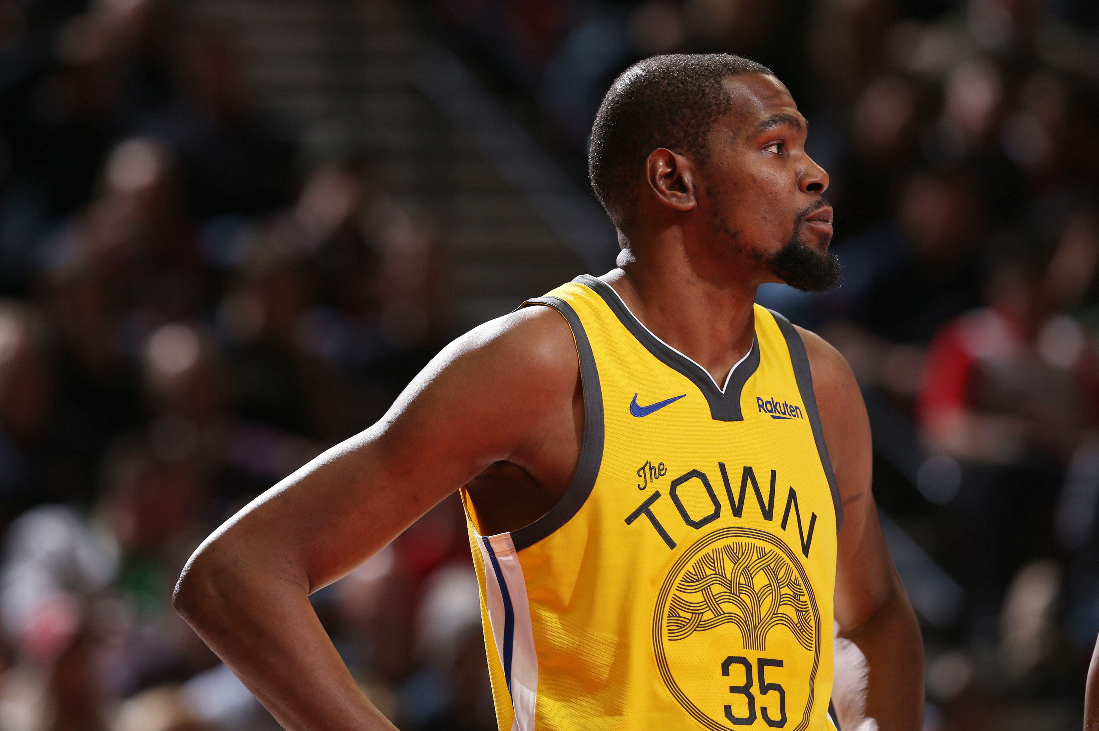PORTLAND, OR - FEBRUARY 13: Kevin Durant #35 of the Golden State Warriors looks on during the game against the Portland Trail Blazers on February 13, 2019 at the Moda Center in Portland, Oregon. NOTE TO USER: User expressly acknowledges and agrees that, b PORTLAND, OR - FEBRUARY 13: Kevin Durant #35 of the Golden State Warriors looks on during the game against the Portland Trail Blazers on February 13, 2019 at the Moda Center in Portland, Oregon. NOTE TO USER: User expressly acknowledges and agrees that, b