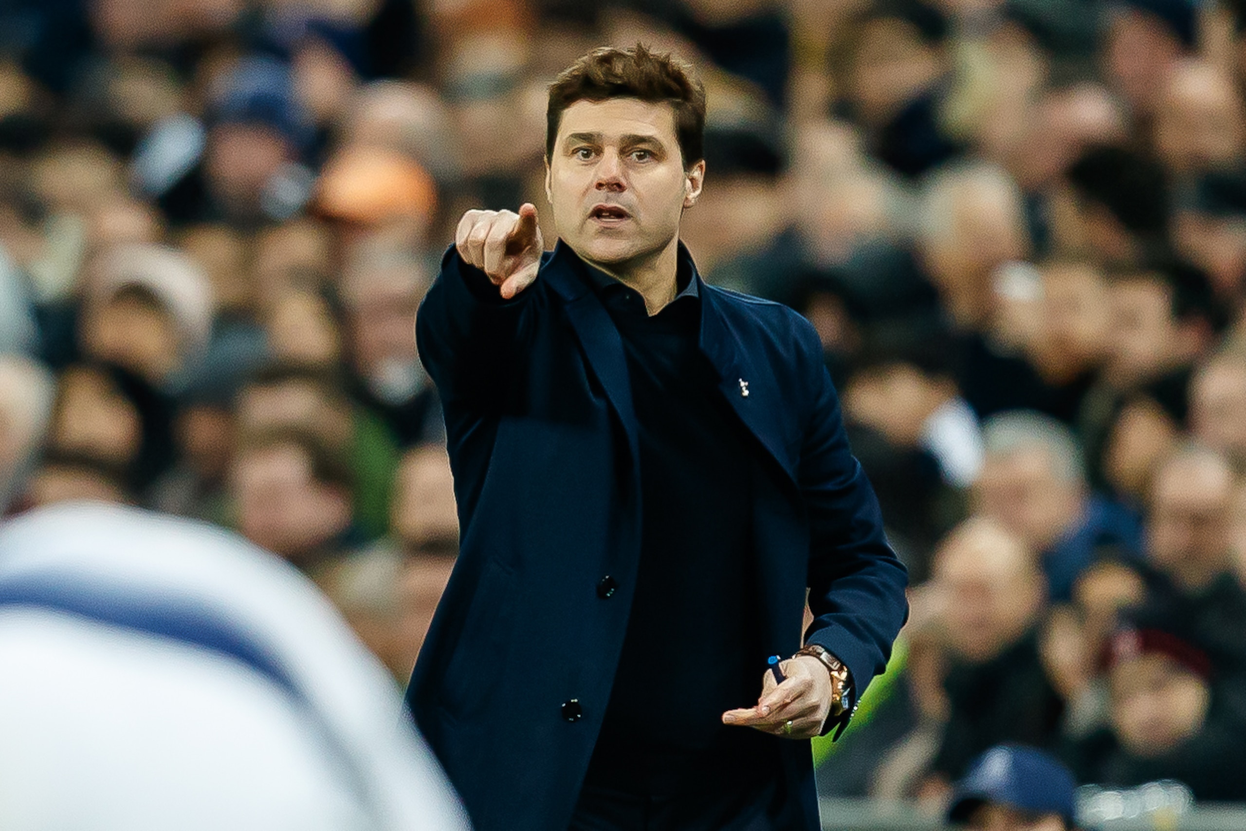 LONDON, ENGLAND - FEBRUARY 13: Head coach Mauricio Pochettino of Tottenham Hotspur gestures during the UEFA Champions League Round of 16 First Leg match between Tottenham Hotspur and Borussia Dortmund at Wembley Stadium on February 13, 2019 in London, Eng LONDON, ENGLAND - FEBRUARY 13: Head coach Mauricio Pochettino of Tottenham Hotspur gestures during the UEFA Champions League Round of 16 First Leg match between Tottenham Hotspur and Borussia Dortmund at Wembley Stadium on February 13, 2019 in London, Eng
