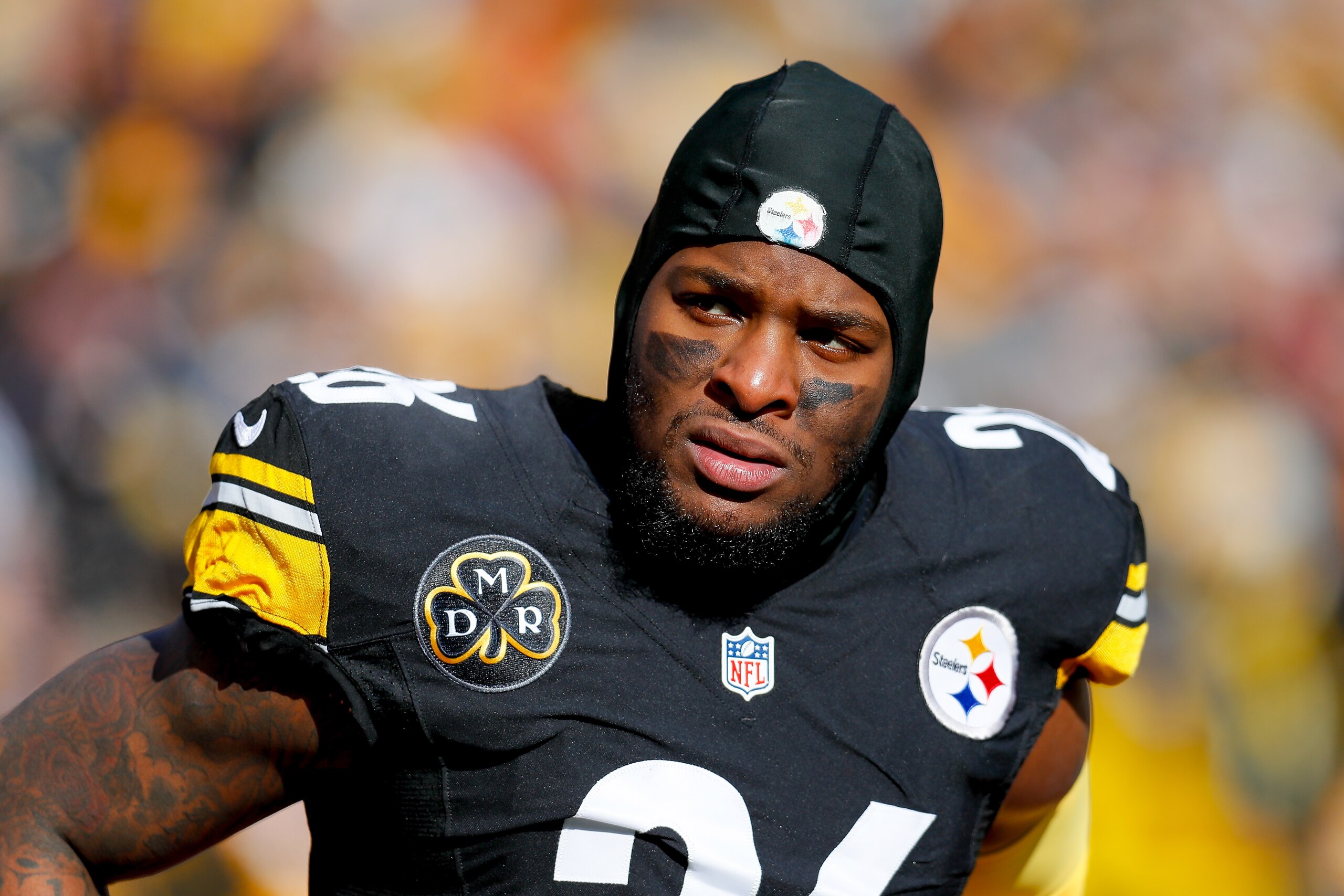 PITTSBURGH, PA - JANUARY 14:  Le'Veon Bell #26 of the Pittsburgh Steelers looks on against the Jacksonville Jaguars during the first half of the AFC Divisional Playoff game at Heinz Field on January 14, 2018 in Pittsburgh, Pennsylvania.  (Photo by Kevin C