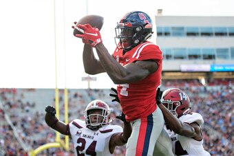 OXFORD, MS - SEPTEMBER 8:  D.K. Metcalf #14 of the Mississippi Rebels catches a pass during a game against the Southern Illinois Salukis at Vaught-Hemingway Stadium on September 8, 2018 in Oxford, Mississippi.  The Rebels defeated the Salukis 76-41.  (Pho