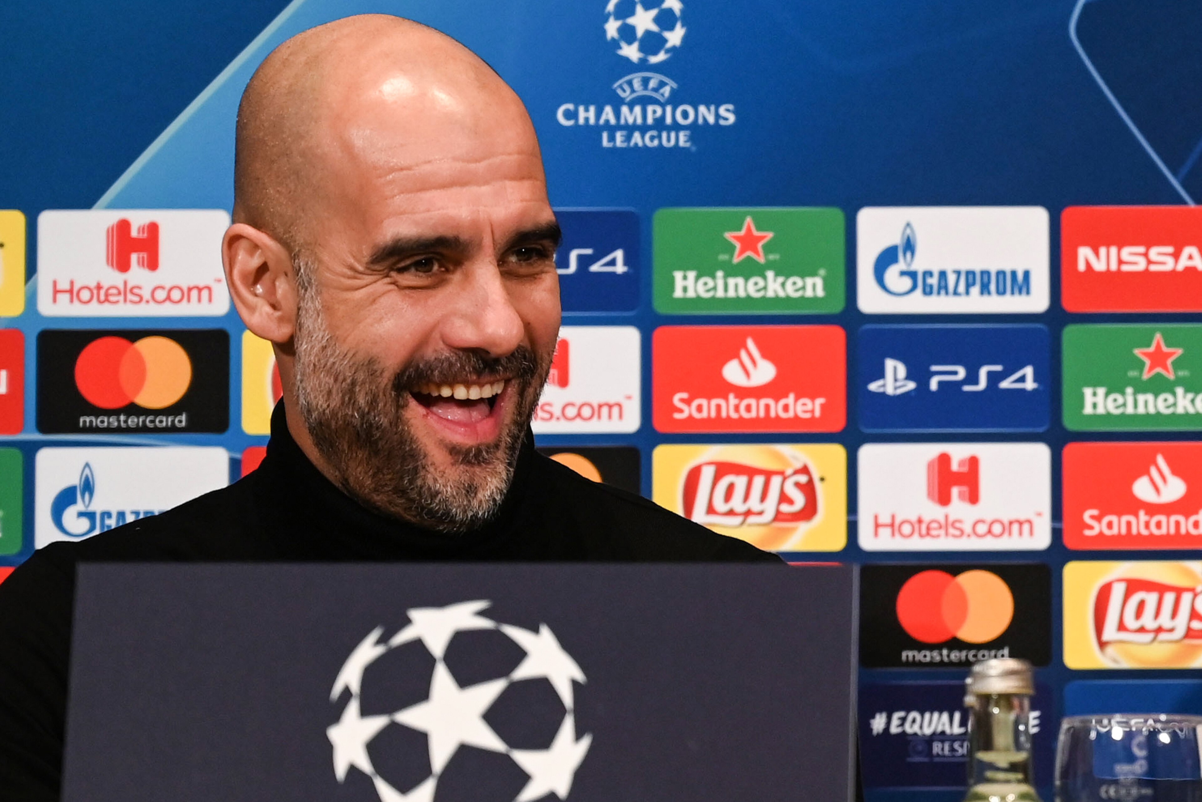 Manchester City's Spanish manager Pep Guardiola attends a press conference on February 19, 2019 in Essen, western Germany, on the eve of the UEFA Champions League, last 16, first leg football match of FC Schalke 04 vs Manchester City. (Photo by Patrik STO