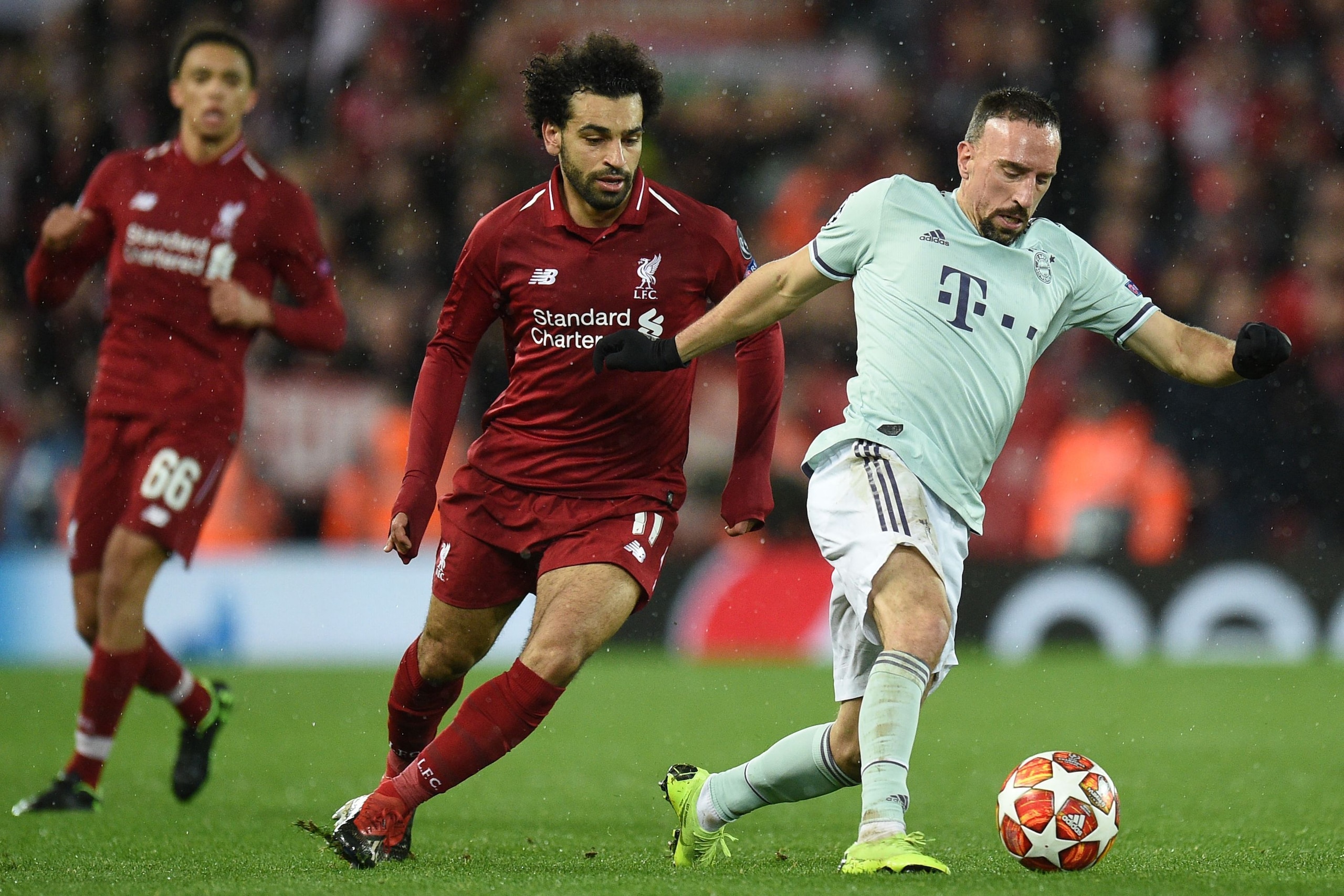 Bayern Munich's French midfielder Franck Ribery (R) vies with Liverpool's Egyptian midfielder Mohamed Salah (C) during the UEFA Champions League round of 16, first leg football match between Liverpool and Bayern Munich at Anfield stadium in Liverpool, nor Bayern Munich's French midfielder Franck Ribery (R) vies with Liverpool's Egyptian midfielder Mohamed Salah (C) during the UEFA Champions League round of 16, first leg football match between Liverpool and Bayern Munich at Anfield stadium in Liverpool, nor
