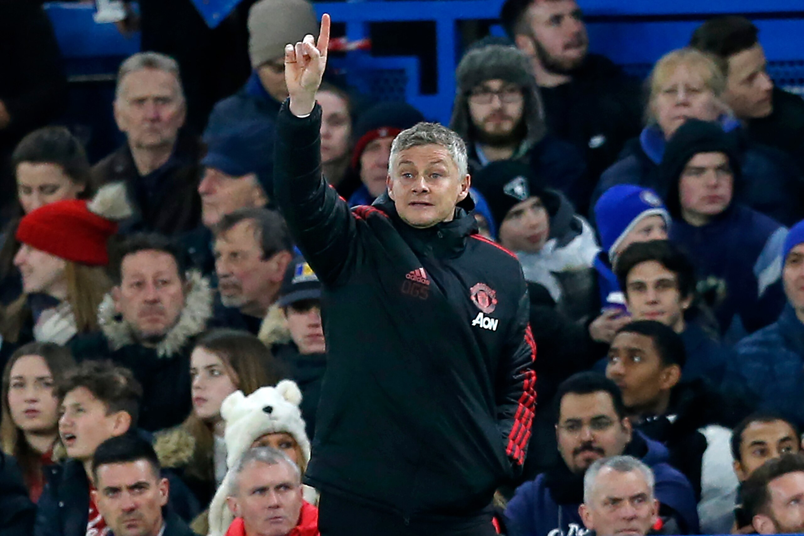 Manchester United's  Norwegian caretaker manager Ole Gunnar Solskjaer gestures on the touchline during the English FA Cup fifth round football match between Chelsea and Manchester United at Stamford Bridge in London on February 18, 2019. (Photo by Ian KIN