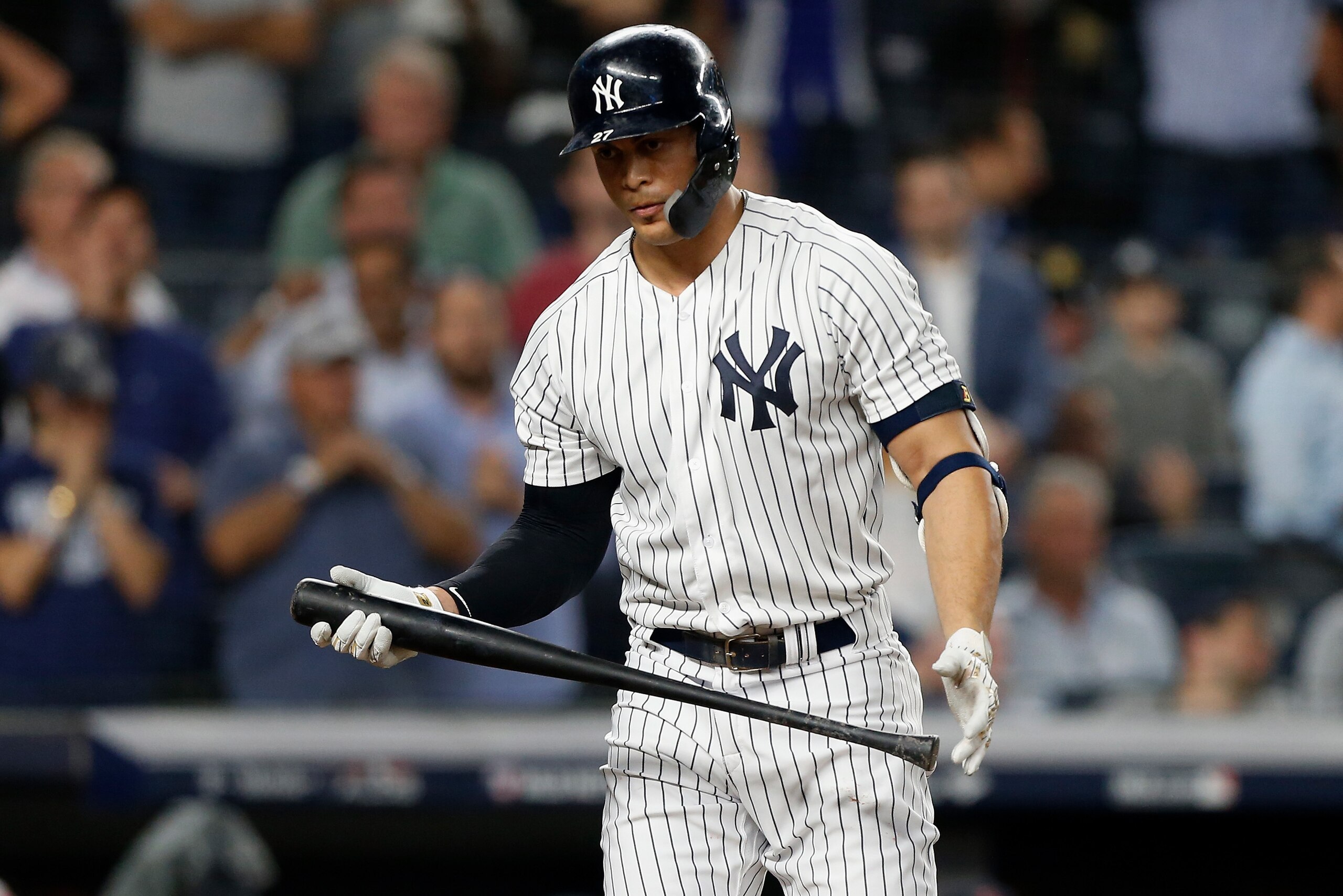 NEW YORK, NY - OCTOBER 09: (NEW YORK DAILIES OUT) Giancarlo Stanton #27 of the New York Yankees strikes out in the ninth inning against the Boston Red Sox in Game Four of the American League Division Series at Yankee Stadium on October 9, 2018 in the B NEW YORK, NY - OCTOBER 09: (NEW YORK DAILIES OUT) Giancarlo Stanton #27 of the New York Yankees strikes out in the ninth inning against the Boston Red Sox in Game Four of the American League Division Series at Yankee Stadium on October 9, 2018 in the B
