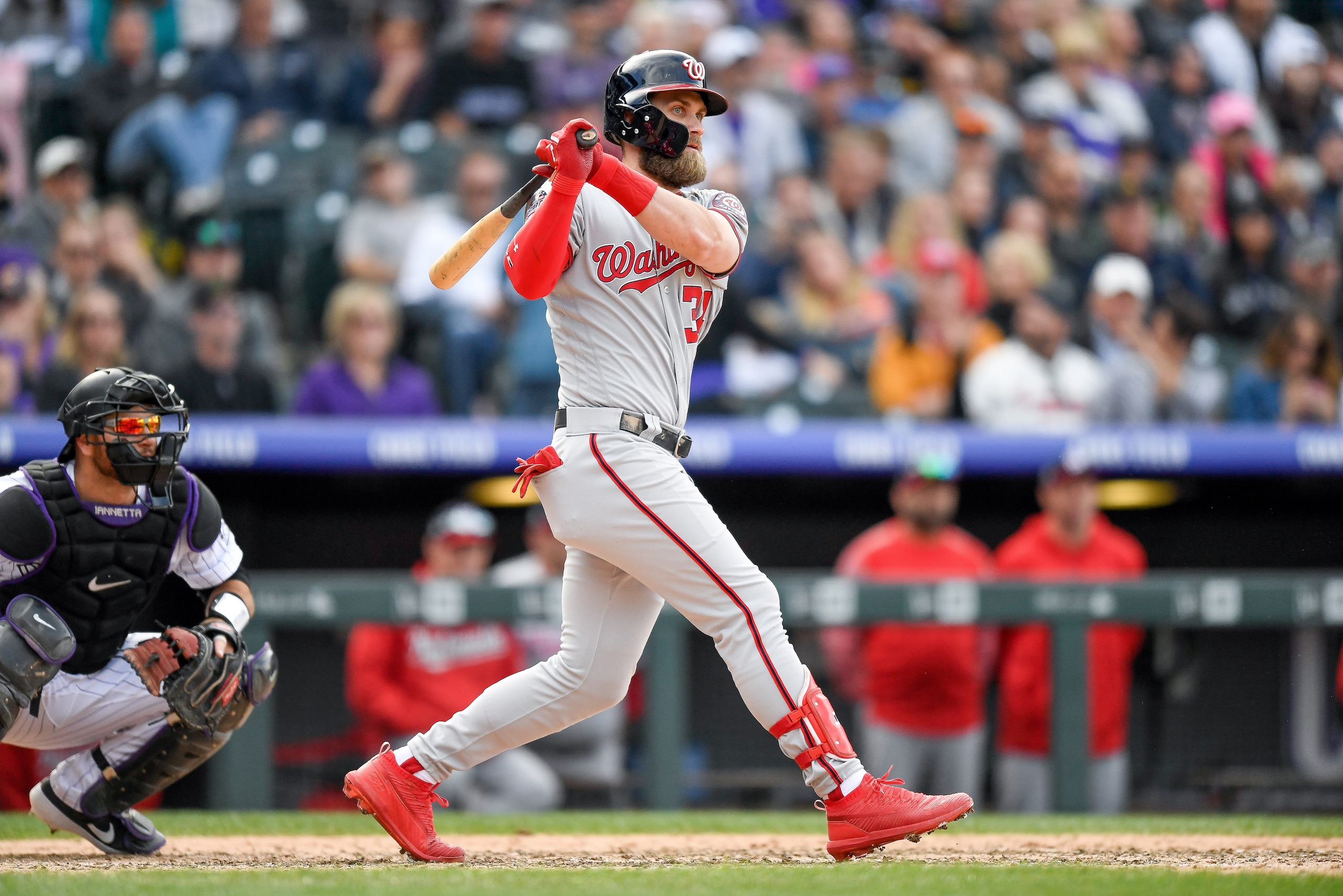 DENVER, CO - SEPTEMBER 30:  Bryce Harper #34 of the Washington Nationals hits a ninth inning double against the Colorado Rockies at Coors Field on September 30, 2018 in Denver, Colorado.  (Photo by Dustin Bradford/Getty Images)