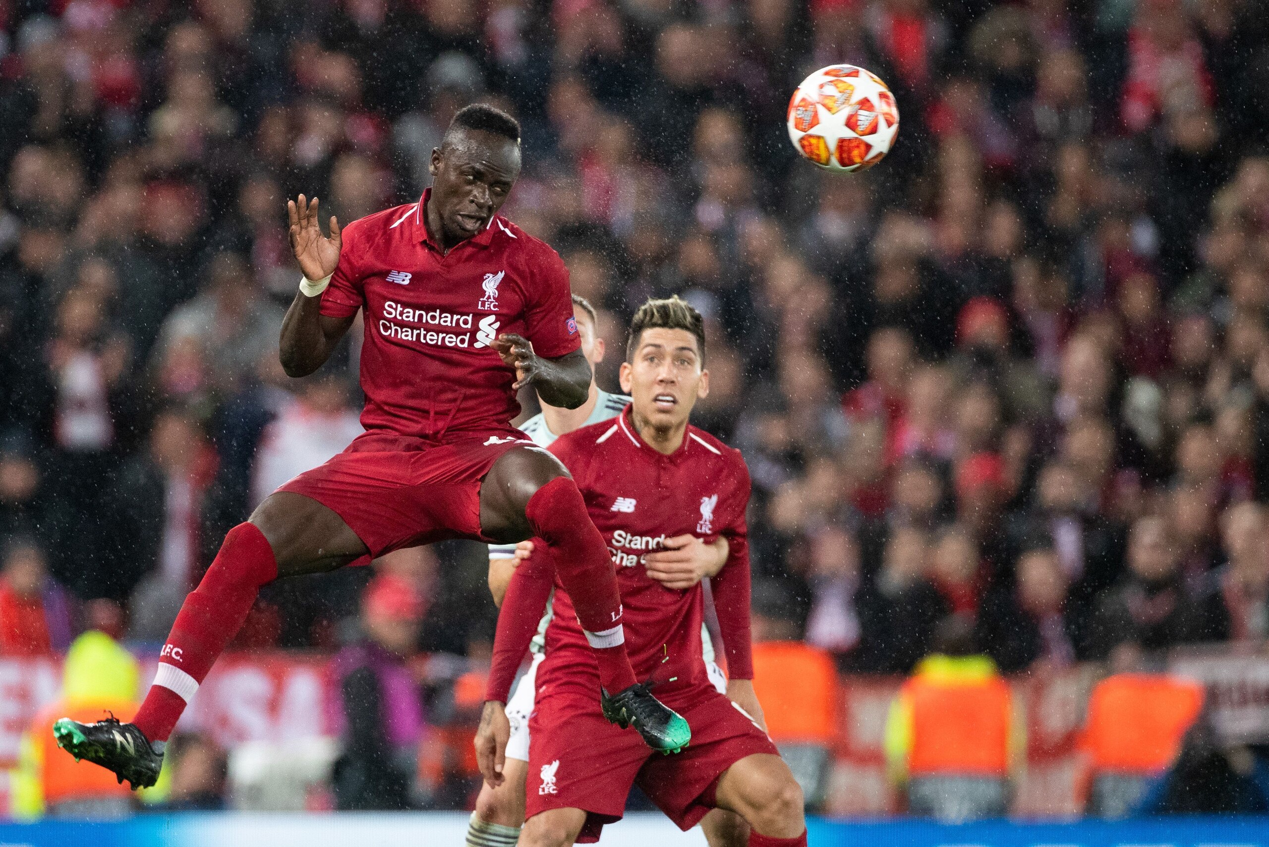 Sadio Mane of Liverpool FC, Roberto Firmino of Liverpool FC during the UEFA Champions League round of 16 match between Liverpool FC and Bayern Munich at Anfield on February 19, 2019 in Liverpool, United Kingdom(Photo by VI Images via Getty Images)