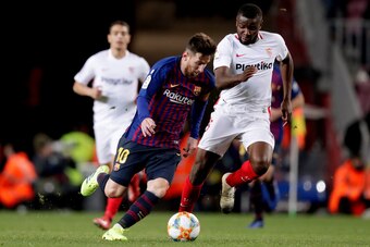 BARCELONA, SPAIN - JANUARY 30: (L-R) Lionel Messi of FC Barcelona, Ibrahim Amadou of Sevilla FC  during the Spanish Copa del Rey  match between FC Barcelona v Sevilla at the Camp Nou on January 30, 2019 in Barcelona Spain (Photo by Jeroen Meuwsen/Soccrate