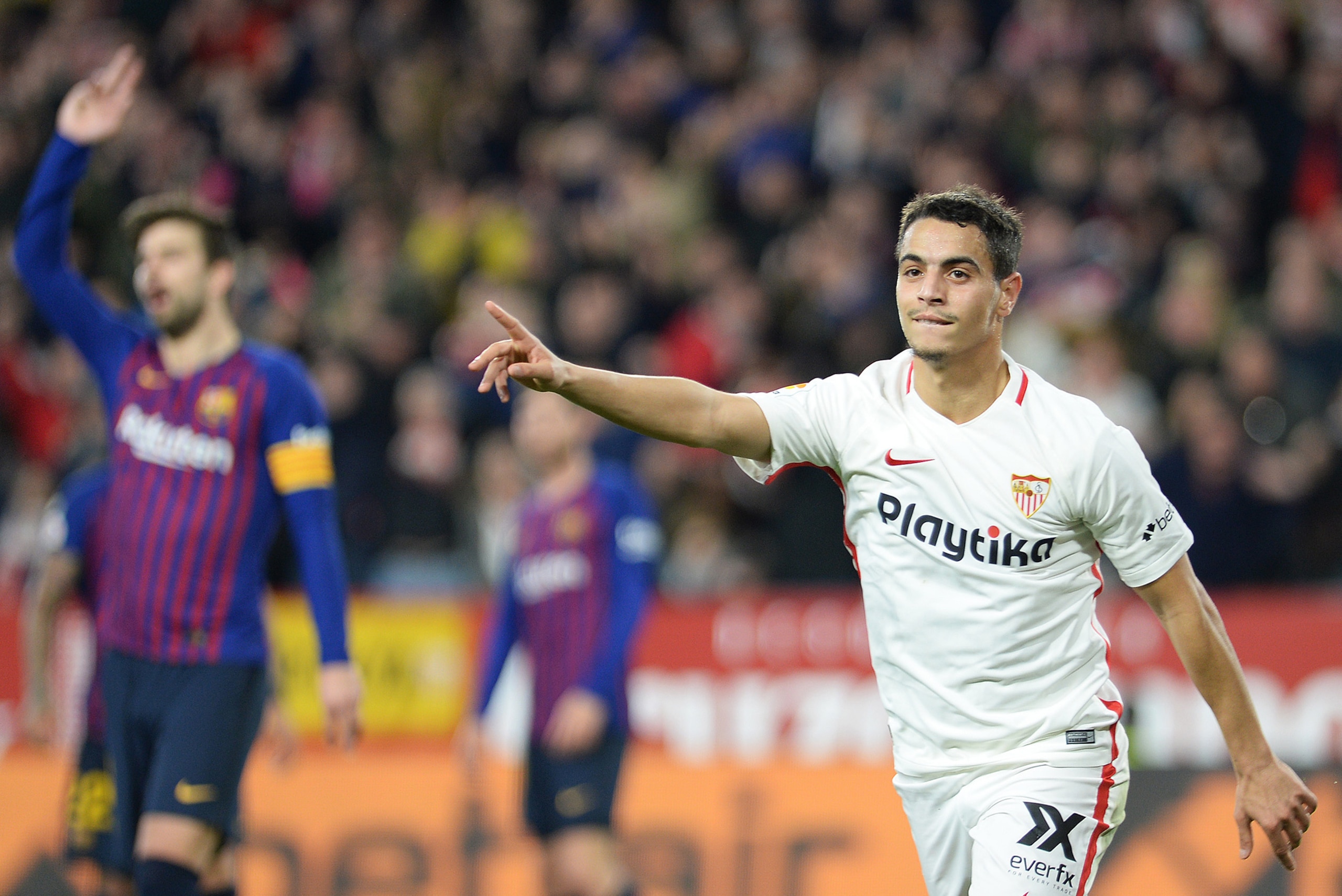 Sevilla's French forward Wissam Ben Yedder celebrates after scoring his team's second goal during the Spanish Copa del Rey (King's Cup) quarter-final first leg football match between Sevilla FC and FC Barcelona at the Ramon Sanchez Pizjuan stadium in Sevi