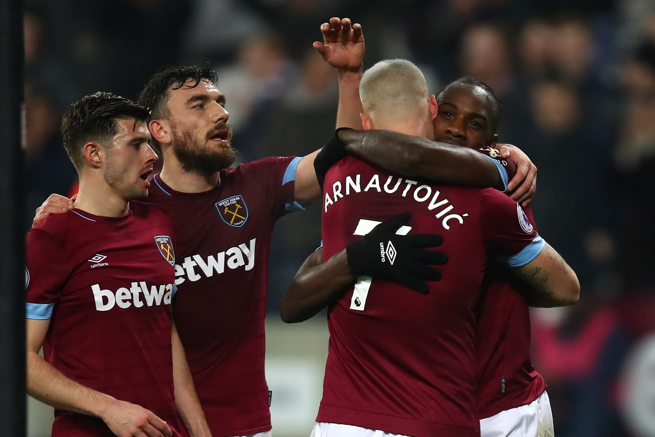 LONDON, ENGLAND - FEBRUARY 22:  Michail Antonio of West Ham United (r) celebrates with Marko Arnautovic of West Ham United after scoring his side's third goal during the Premier League match between West Ham United and Fulham FC at the London Stadium on F