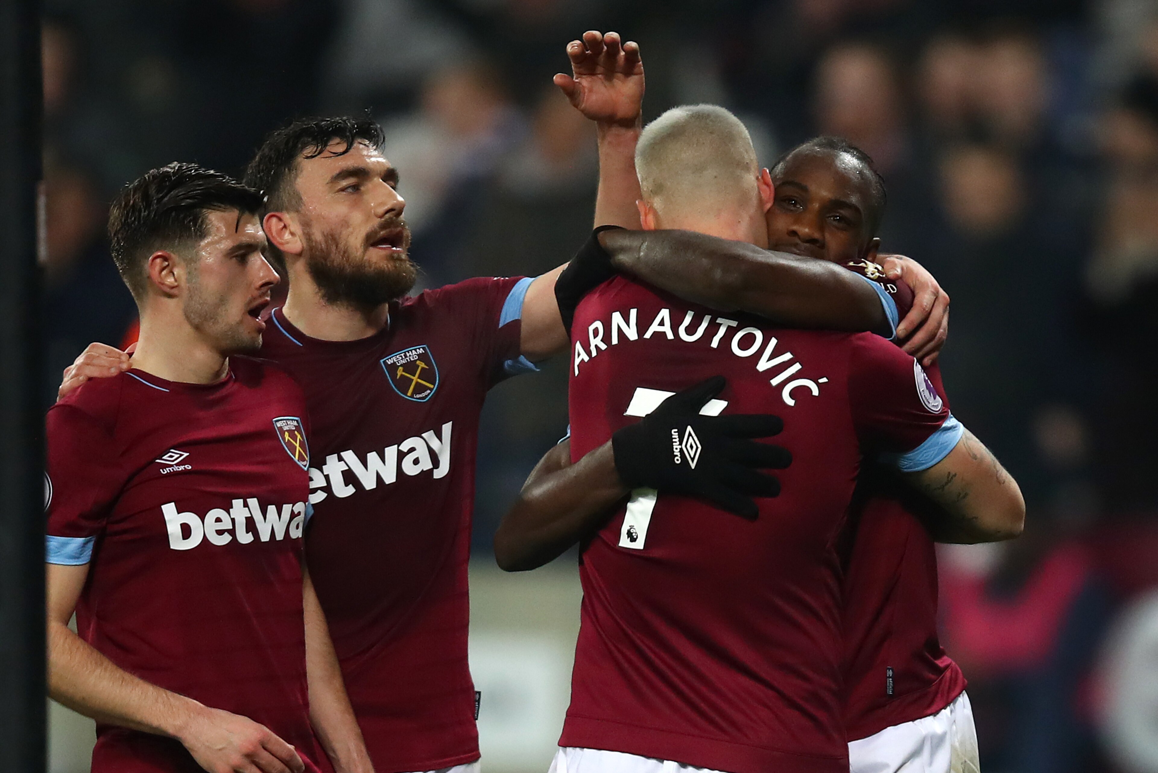 LONDON, ENGLAND - FEBRUARY 22:  Michail Antonio of West Ham United (r) celebrates with Marko Arnautovic of West Ham United after scoring his side's third goal during the Premier League match between West Ham United and Fulham FC at the London Stadium on F