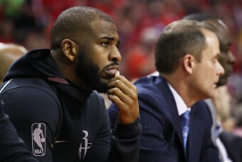 HOUSTON, TX - MAY 28:  Chris Paul #3 of the Houston Rockets looks on from the bench in the first quarter of Game Seven of the Western Conference Finals of the 2018 NBA Playoffs against the Golden State Warriors at Toyota Center on May 28, 2018 in Houston,