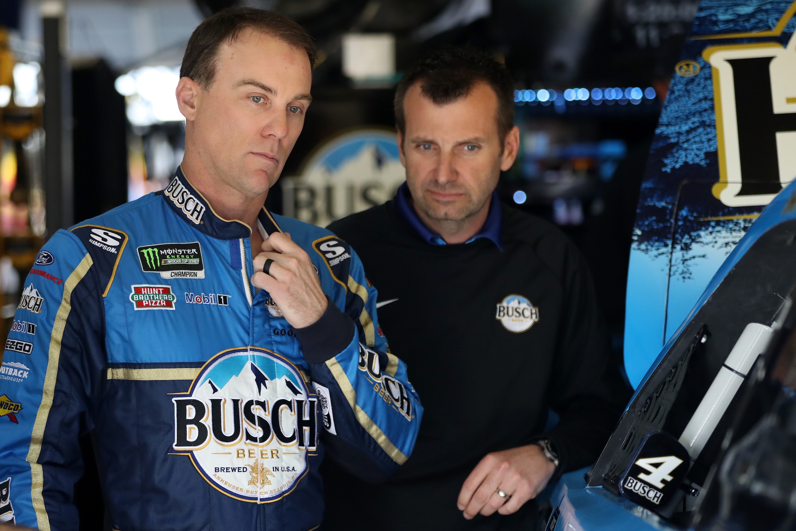 HAMPTON, GA - FEBRUARY 22:  Kevin Harvick, driver of the #4 Busch Beer Ford, talks with crew chief Rodney Childers during practice for the Monster Energy NASCAR Cup Series Folds of Honor Quiktrip 500 at Atlanta Motor Speedway on February 22, 2019 in Hampt