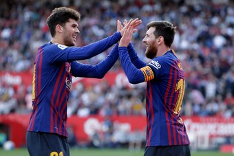 SEVILLA, SPAIN - FEBRUARY 23: Lionel Messi of FC Barcelona celebrates 2-3 with Carles Alena of FC Barcelona  during the La Liga Santander  match between Sevilla v FC Barcelona at the Estadio Ramon Sanchez Pizjuan on February 23, 2019 in Sevilla Spain (Pho
